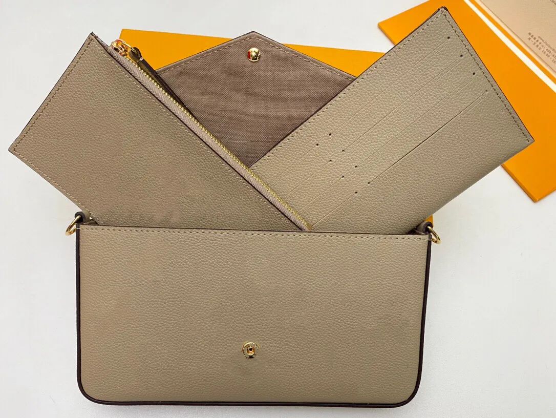 69977 Shoulder Bag FELICIE POCHETTE Dove Grey Empreinte Leather with Bold Cream Flower Print Enve... | DHGate