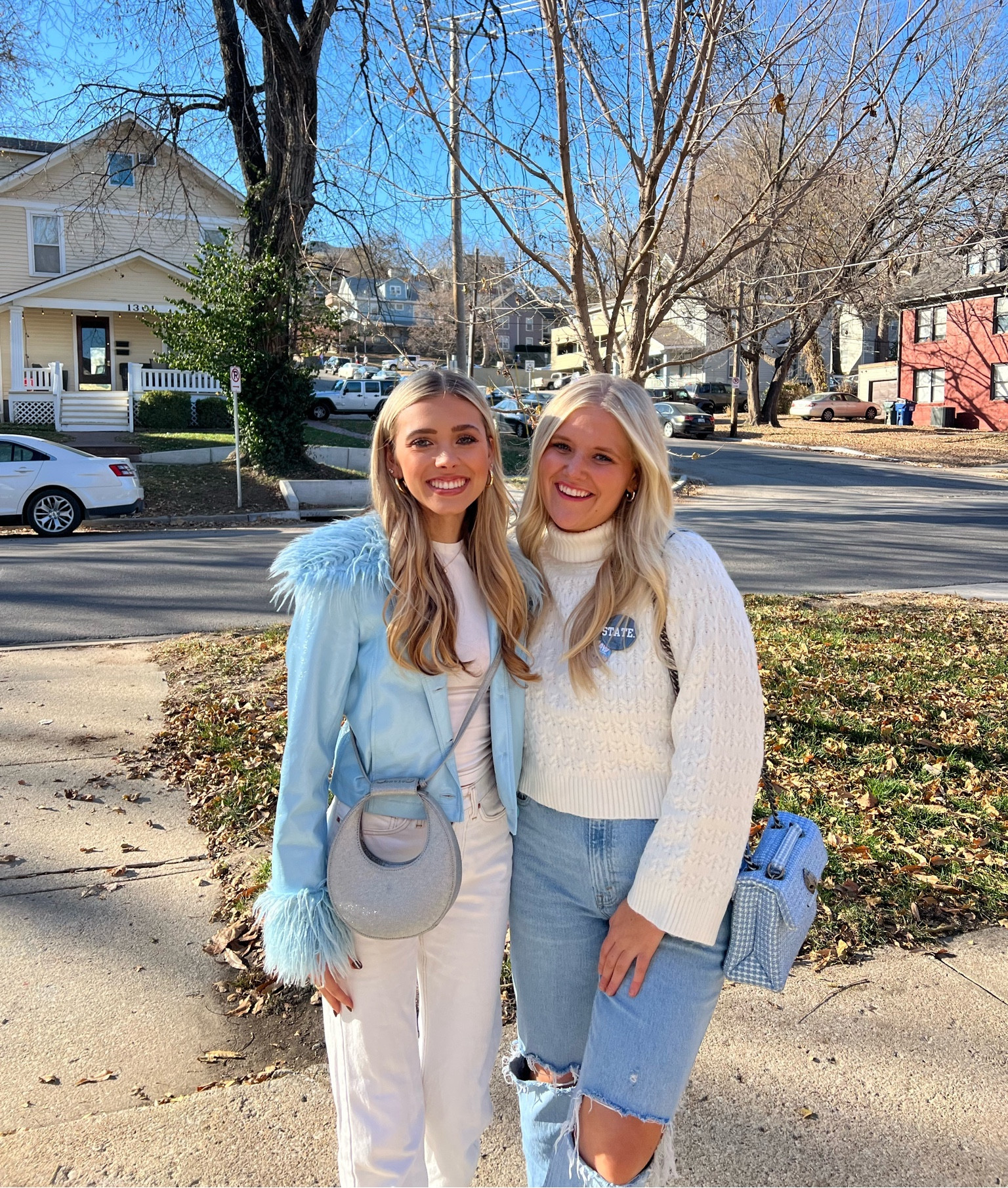 LAST GAMEDAY 💙 Spiced up my last football gameday fit with this fun feather jacket from @uokansas 🤍 Paired with all cream underneath with jeans that are on sale for under $60 & my new fav @staud bag!! It is a must for the holidays! So happy to have my sweet friend visit 🫶🏼 

#LTKfindsunder100 #LTKHoliday #LTKCyberWeek