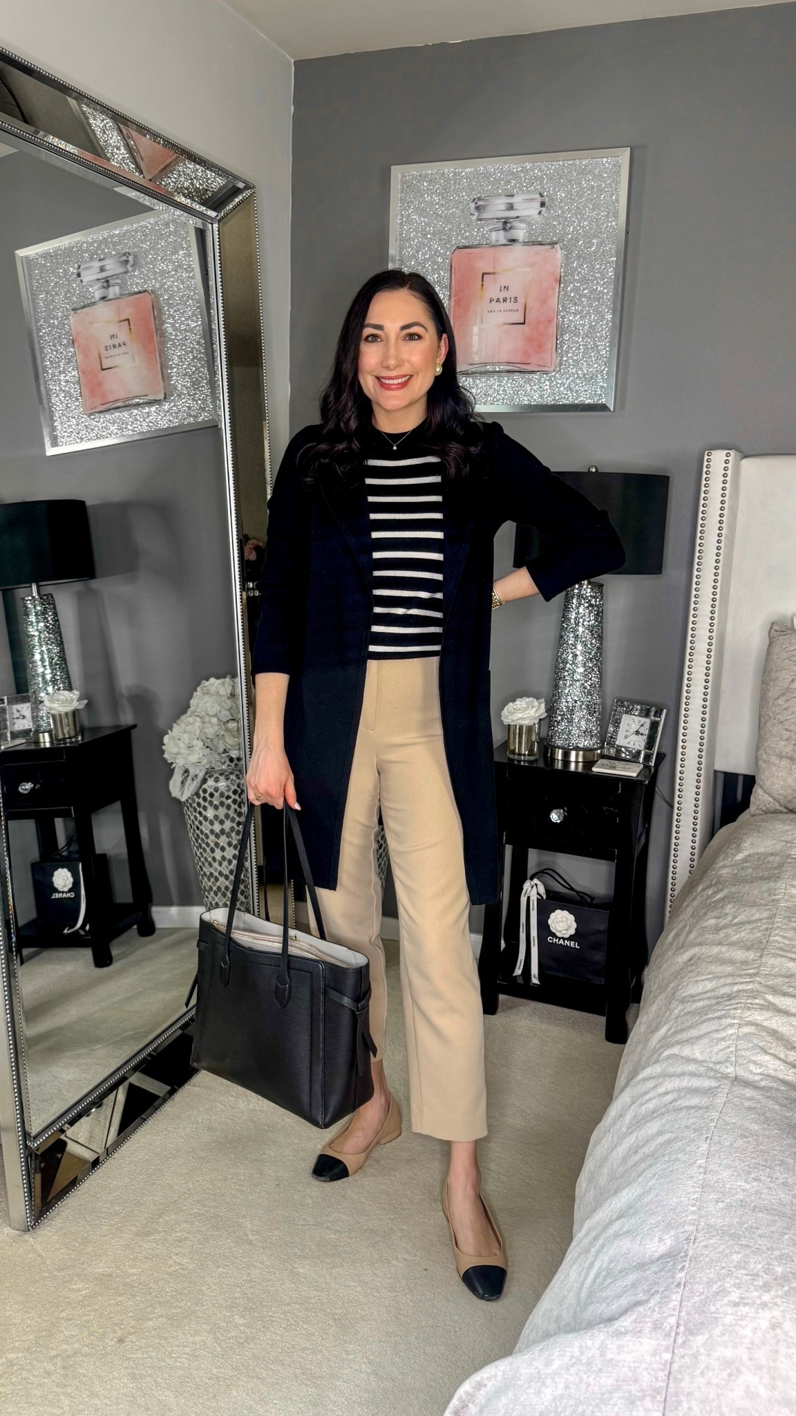 Classic business casual work outfit 🖤

Black cardigan 
Black and white striped top 
Tan pants 
Cap toe flats 

Work wear 
Office outfit 

#LTKWorkwear #LTKSeasonal
