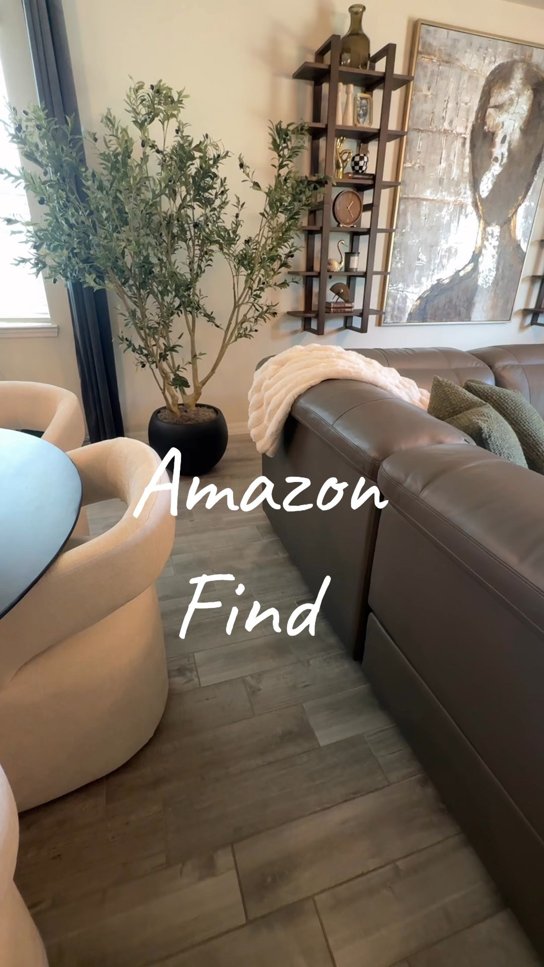 Found the perfect tall and very wide and full faux olive tree on #Amazon for my client! It adds so much drama and presence to the room. This one is 7-feet.  What size are you looking for? Check it out along with an amazing planter to complete the look! 

#LTKStyleTip #LTKHome