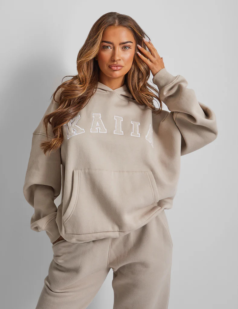 Kaiia Slogan Oversized Hoodie Stone | Public Desire