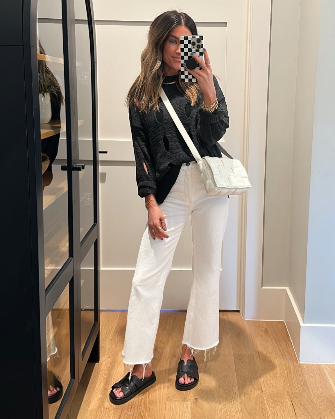 Wearing size xs in this hole-knit sweater. Would also be so cute over a swimsuit!! // I chopped the bottoms off these jeans!😁



#LTKtravel #LTKshoecrush #LTKstyletip