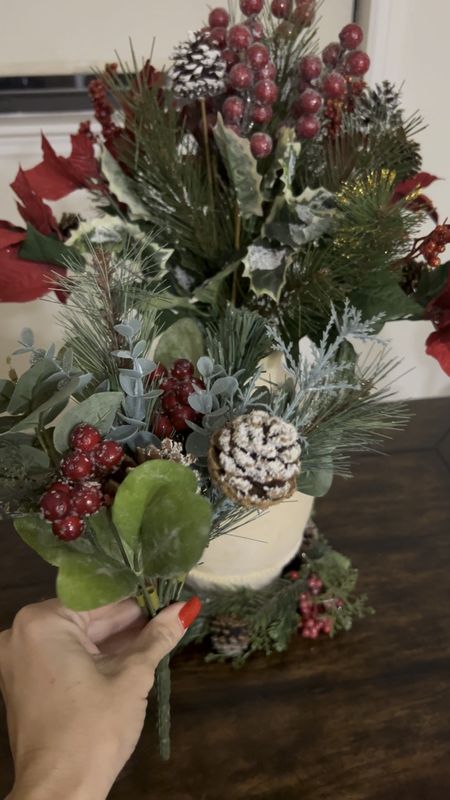 This terracotta vase is filled with so many random stems (mix of short & long) all from Michael’s. I centered it inside a mini wreath. 
Christmas florals. Christmas decor. Centerpiece arrangements. Holiday festive. Greenery  

#LTKVideo #LTKHoliday #LTKSeasonal