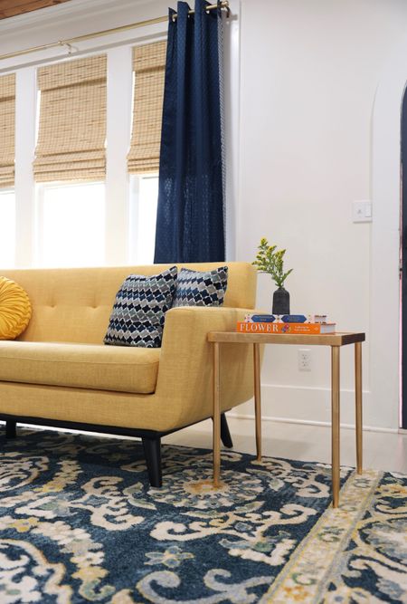 Loving the pops of yellow in this room! 

I wasn’t able to link everything but I found similar options!

Sofa, throw pillows, couch, end table, area rug

#LTKSeasonal #LTKhome #LTKstyletip