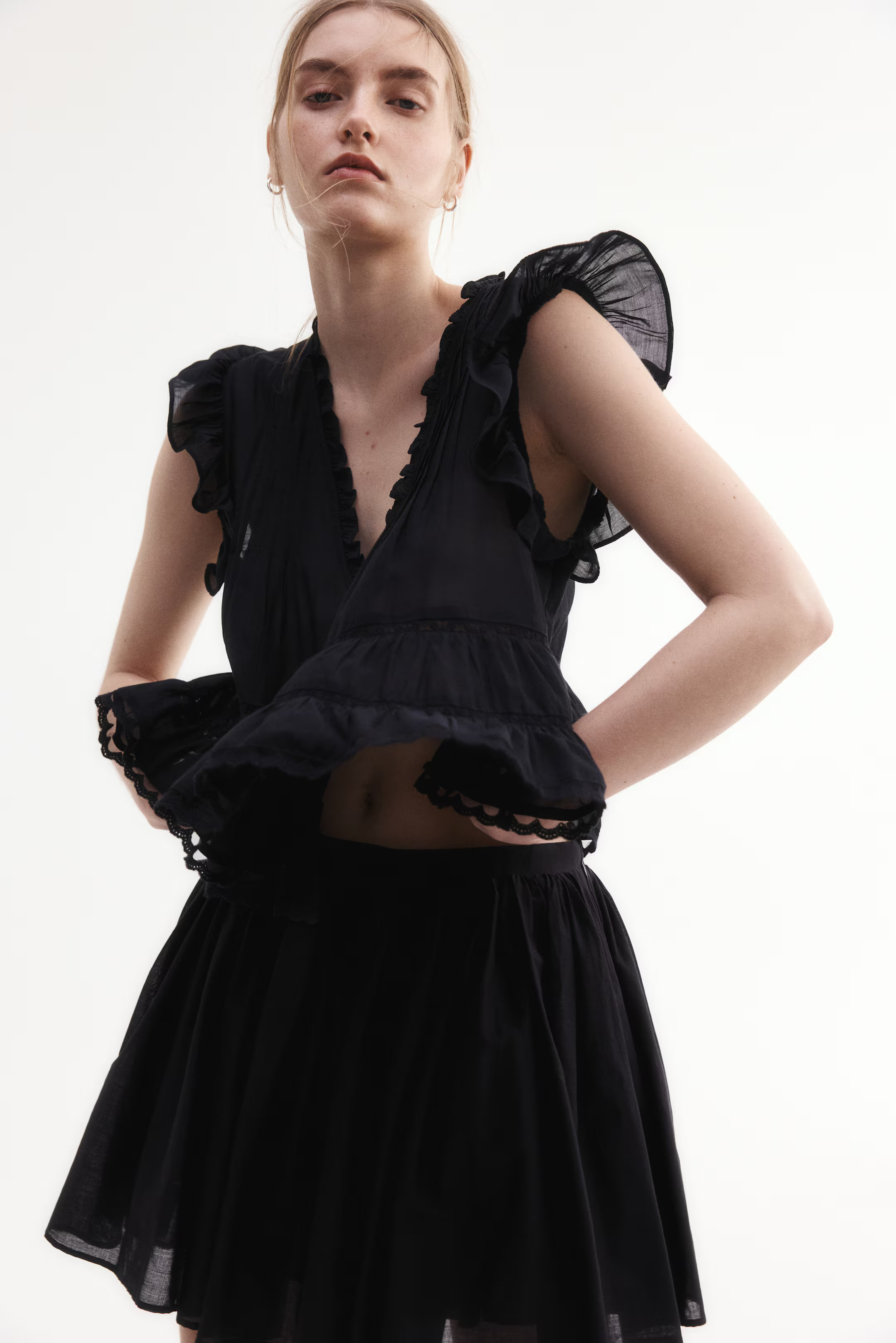 Blouse met platte plooitjes | H&M (DE, AT, CH, NL, FI)