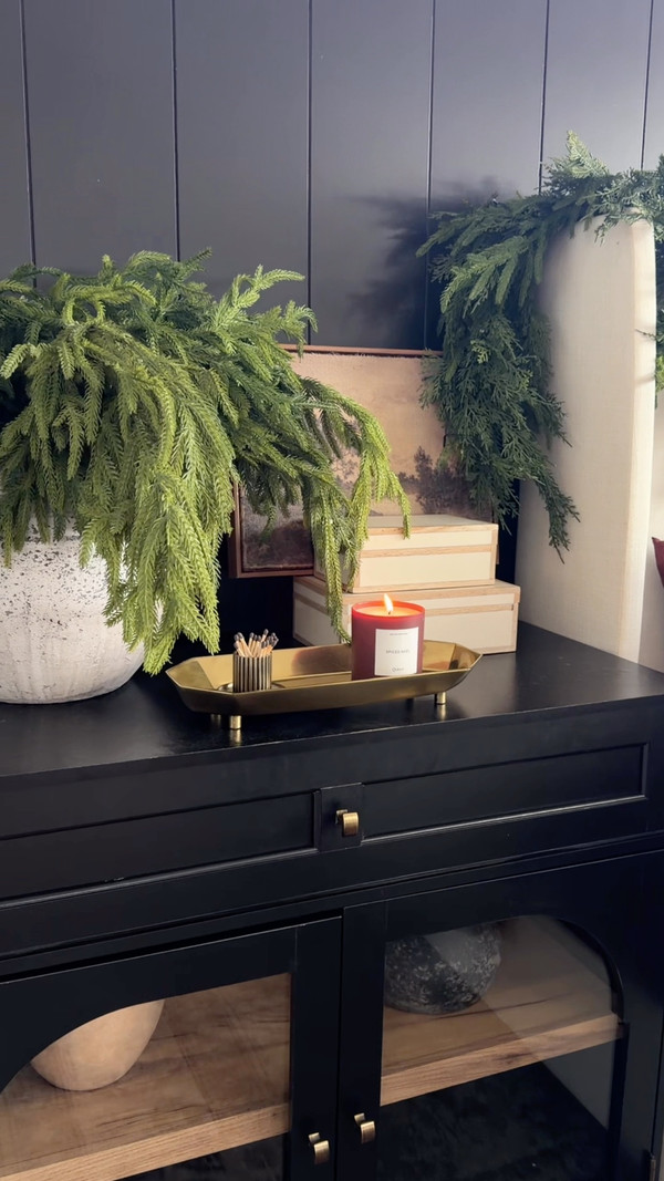 I wanted our bedroom to feel warm and festive for the holidays, so I layered this…