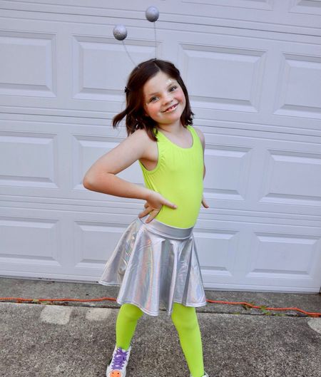 Cute and simple costume! The glitter came with the headband and the primer is what we used to apply the glitter on her face and lips!