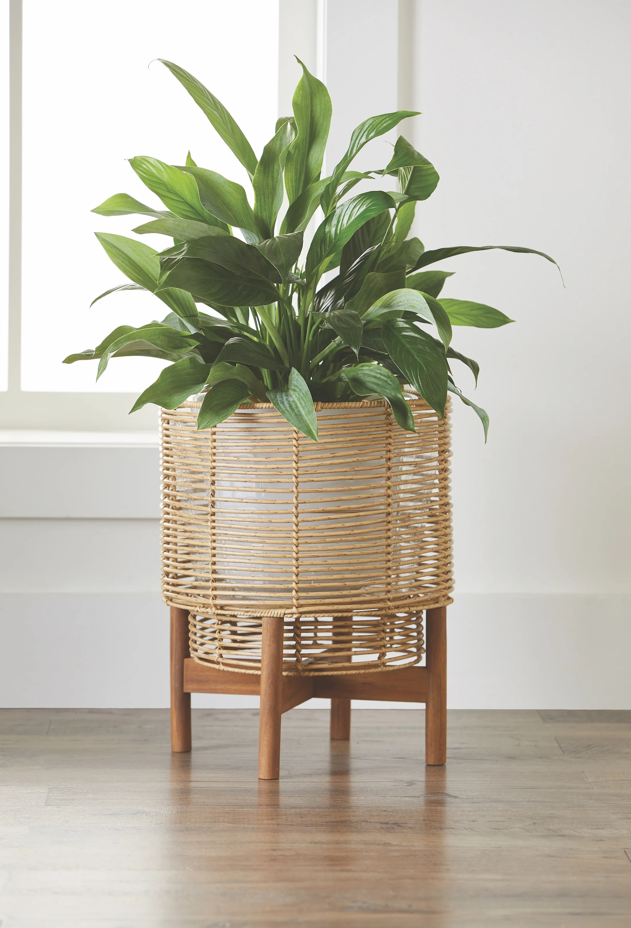 Better Homes & GardensBetter Homes & Gardens Tan Round Resin Rattan Planter & Stand SetUSD$29.98(... | Walmart (US)