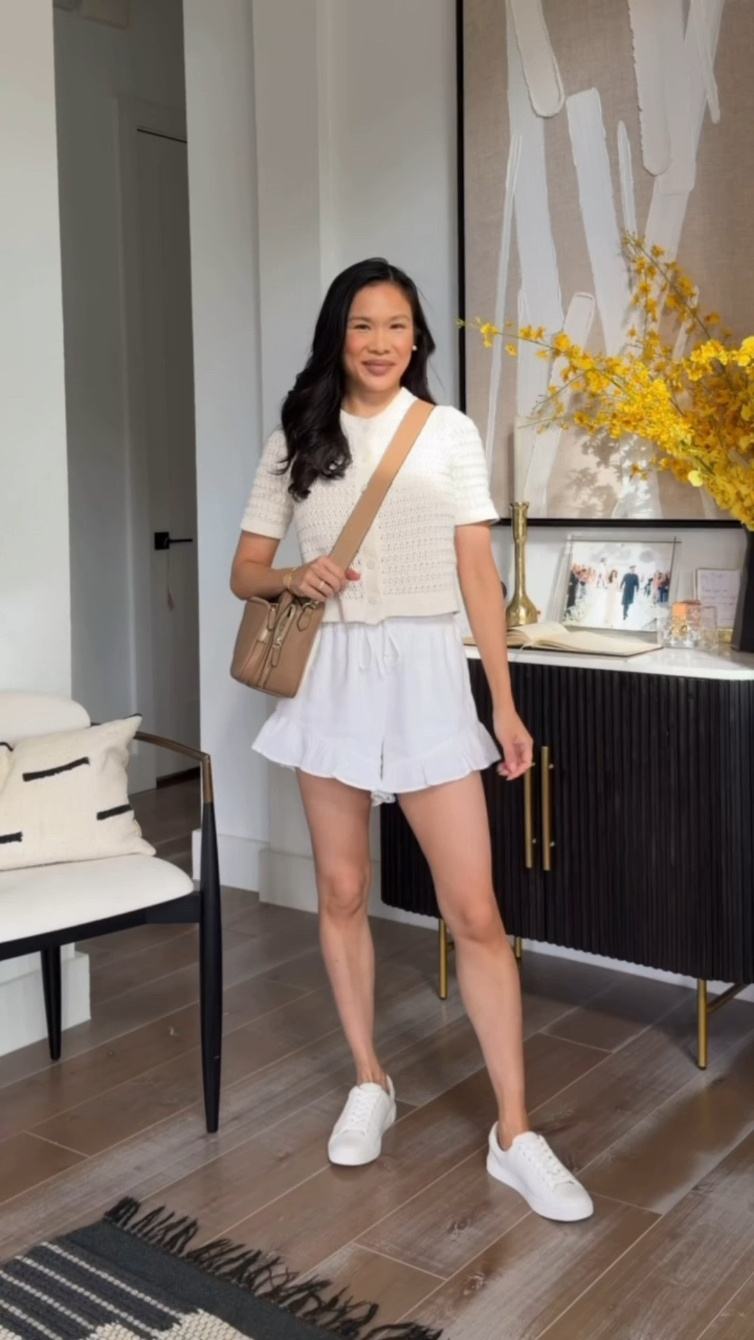 Warm weather outfit formula with ruffle pull on shorts, textured top and either sneakers or flats for a put together look! Love this for the summer, great for moms, and breast feeding friendly

#LTKSeasonal #LTKmomlife #LTKootd