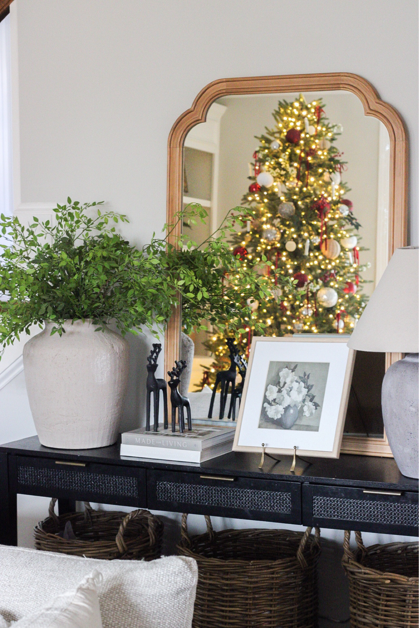 Love this view so much! 

Console table styling, black accent table, living room decor, Christmas decor 

#LTKHome #LTKHoliday #LTKStyleTip