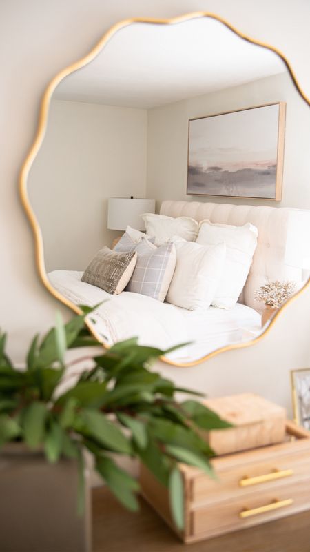 Gold scalloped mirror, coastal style bedroom decor, artwork, bedding, artificial plant, throw pillows 

#LTKhome #LTKfamily