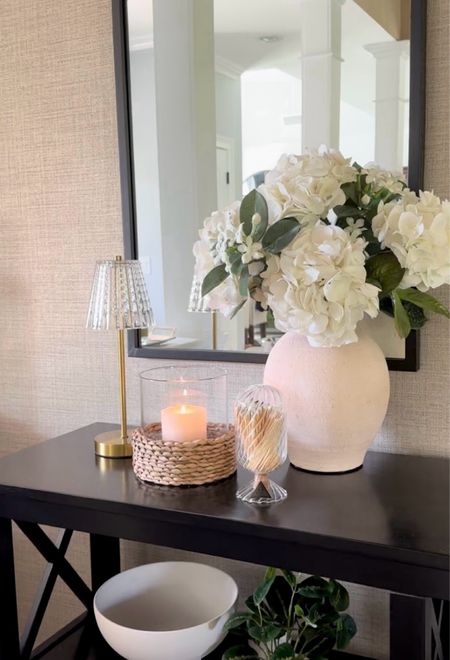 Summer refresh! Shop new hurricane candleholder from Walmart for $15, textured vase on sale at Target, touch lamp, candle accessories, console table, mirror, pedestal bowl, potted plant. Free shipping. 