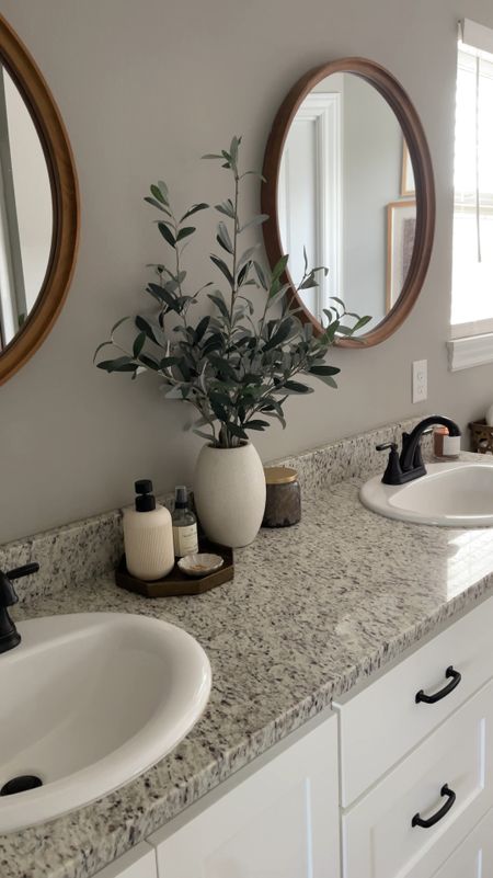 It always feels good to freshen up my bathroom countertop, since I rarely do! I always try to include the functional items first, then add in the decor!

#LTKhome #LTKVideo #LTKstyletip