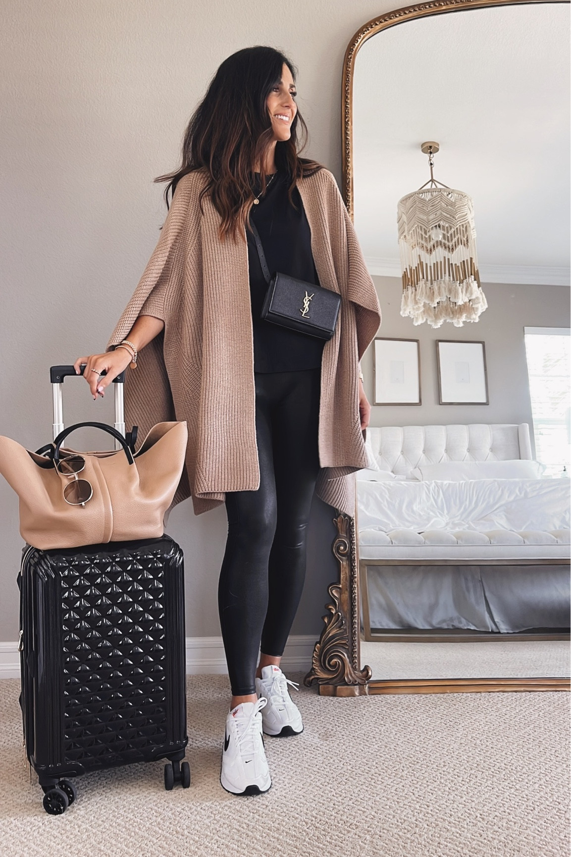 My go to travel look, Ruana, faux leather leggings, accessories, StylinByAylin 

#LTKunder100 #LTKtravel #LTKSeasonal