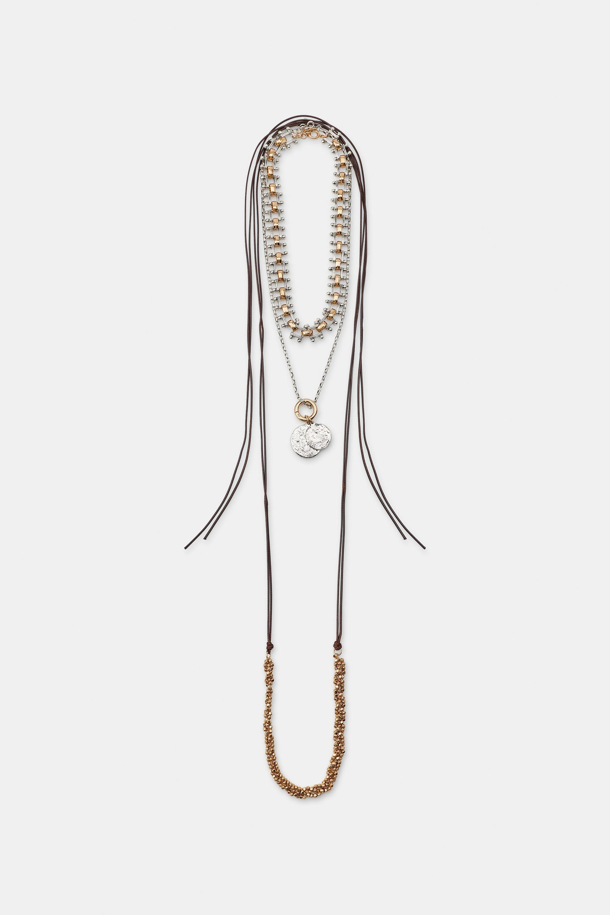 Model height: 183 cmPack of three necklaces in different lengths:- Necklace featuring combined me... | Zara UK