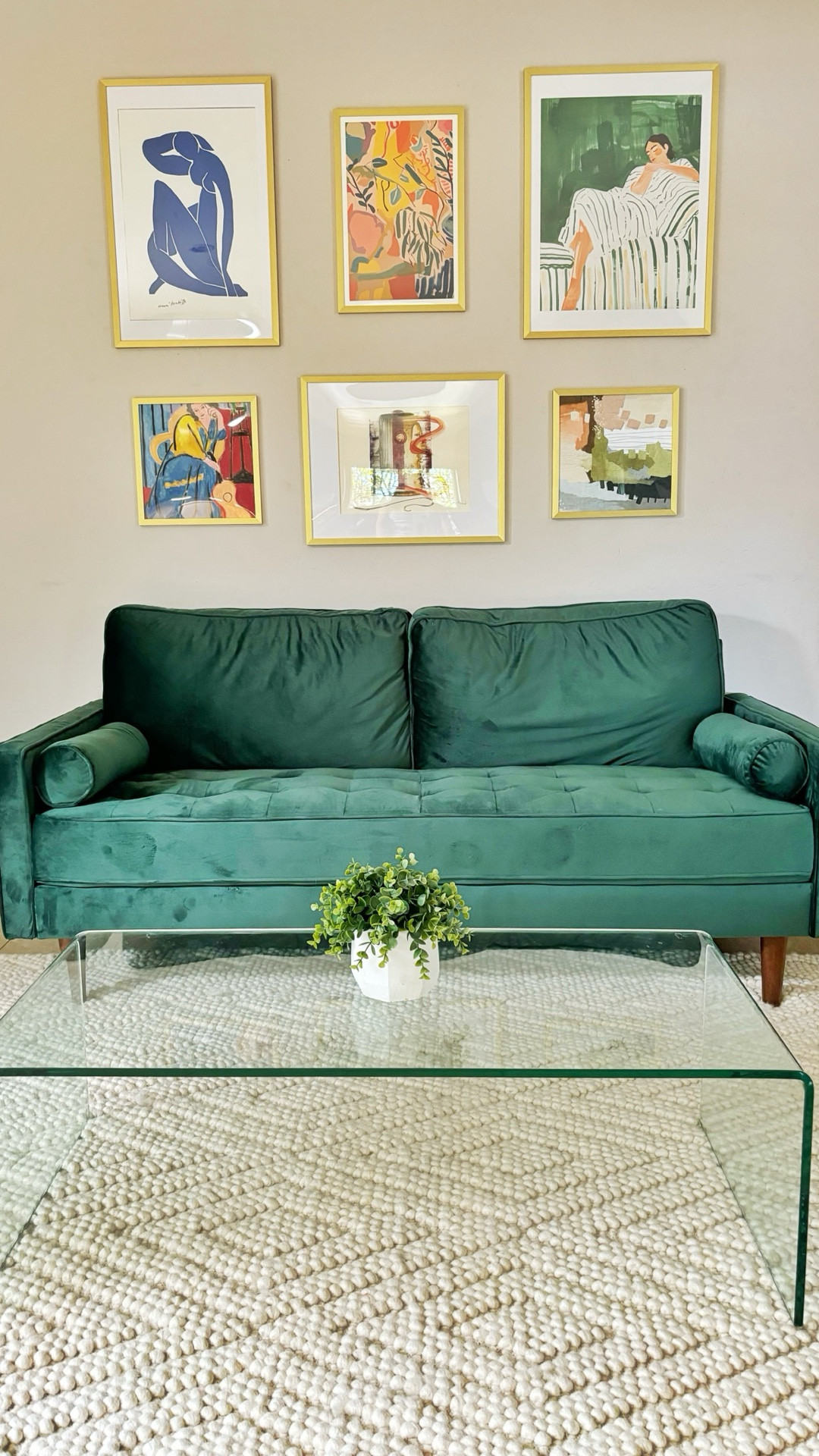 Julie  wanted a gallery wall.  Gallery walls are not always the easiest things to pull off but we ordered these prints on Etsy and they make a statement over her green velvet couch.  We made this work by doing all gold frames and by repeating a common color palette throughout the prints.  Some prints have more negative space and that helps a gallery wall not be too overwhelming.  No more boring seating area. 

#LTKHome #LTKFindsUnder50