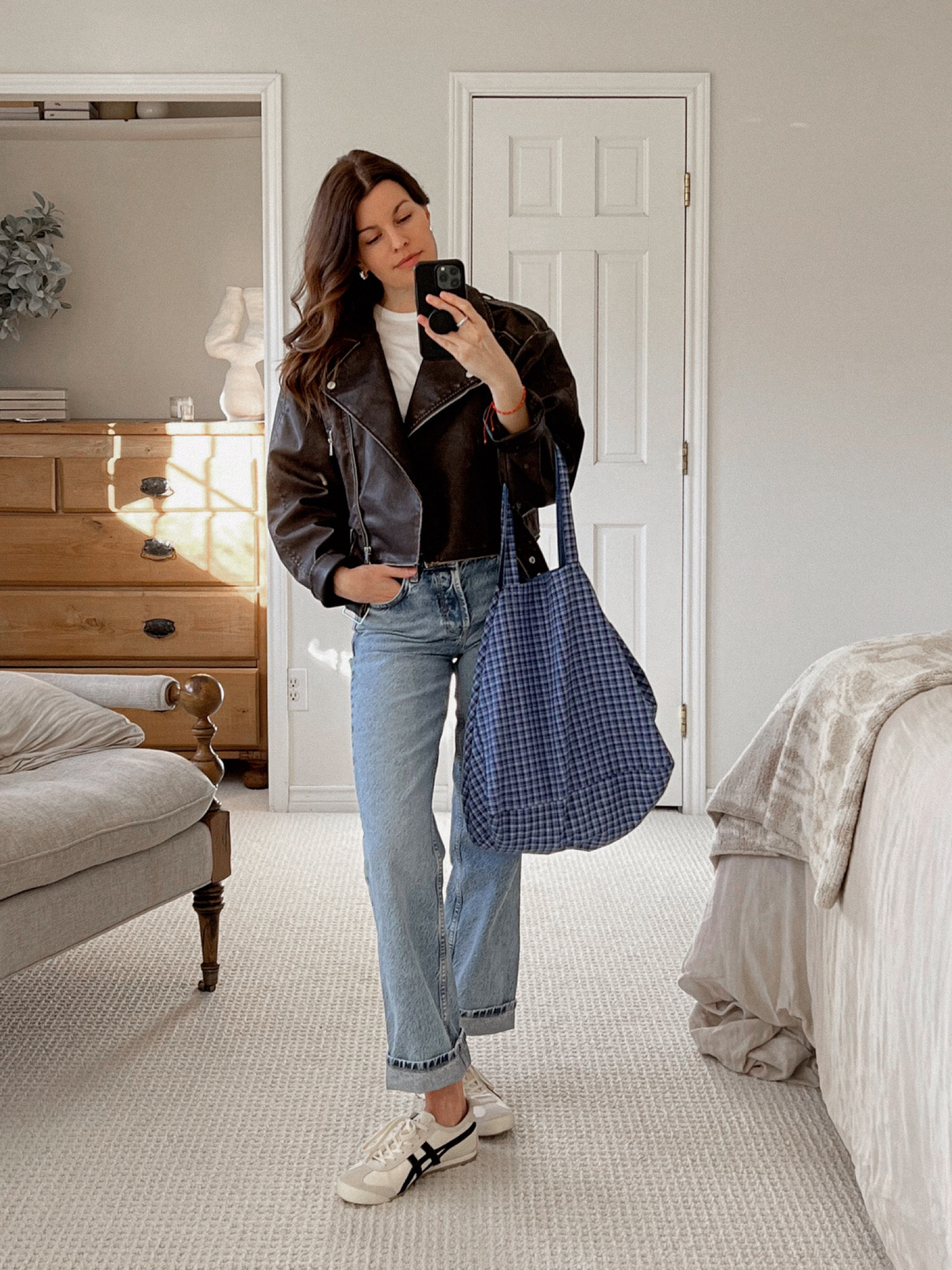 Don’t sleep on this Moto jacket from H&M! Love that it’s not totally black — more like a vintage black/brown. Wearing a Small. 

#LTKSpringSale #LTKsalealert #LTKSeasonal