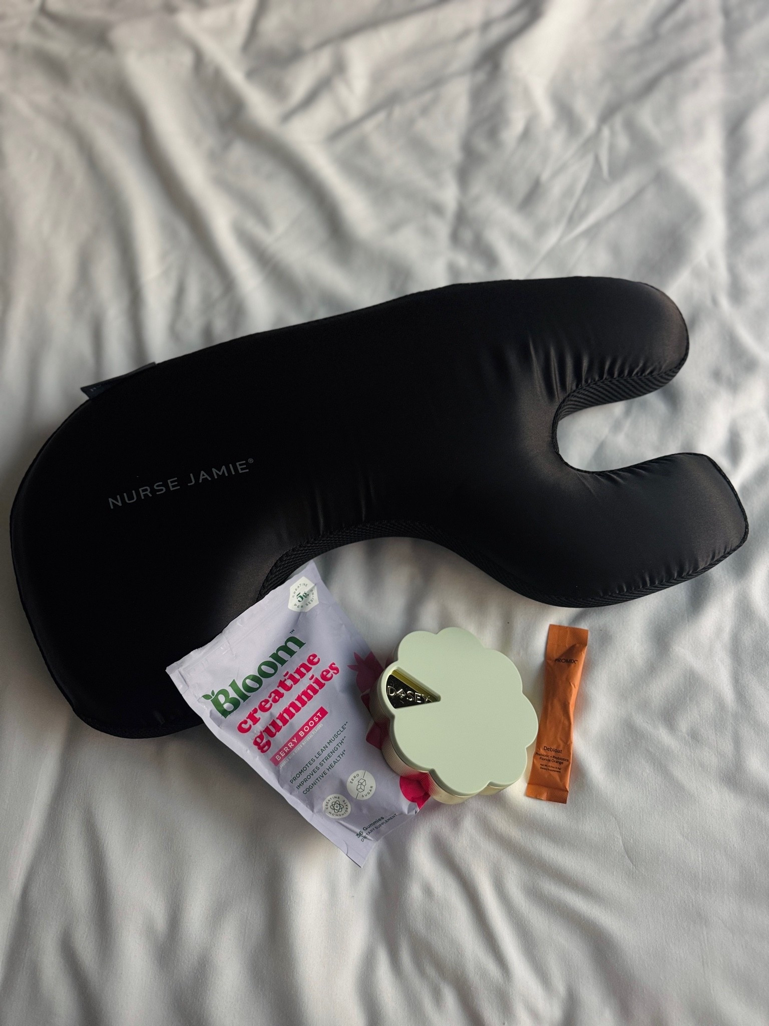 Travel must haves. I recently incorporated this slide sleeping pillow into my routine at home but it was a good size for travel too. I stack it onto my normal pillow and did the same at the hotel. It took me a bit to get used to it but now I love! Also traveled with my supplements and the probiotics helped so much with my travel digestive issues. I don’t do creatine gummies at home but got them for travel and made that easy! Linking my toiletry bag and personal bag for air travel. Not pictured.

#LTKOver40 #LTKActive #LTKTravel