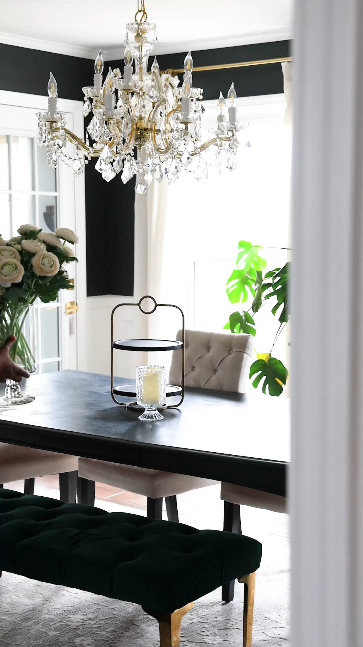 Copy the style of this sophisticated dining room with moody vibes, and glam touches. | From the showstopping chandelier, to the real-looking artificial flowers, the vases, the mirrors, the sideboard buffet, dining chairs, and beyond! 

 #LTKHome