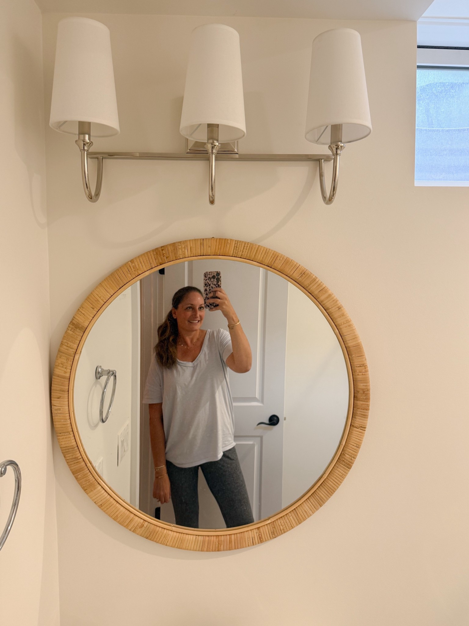 This round rattan mirror and sconce were such affordable finds and look great in our basement bathroom! 

#LTKHome #LTKStyleTip #LTKSaleAlert