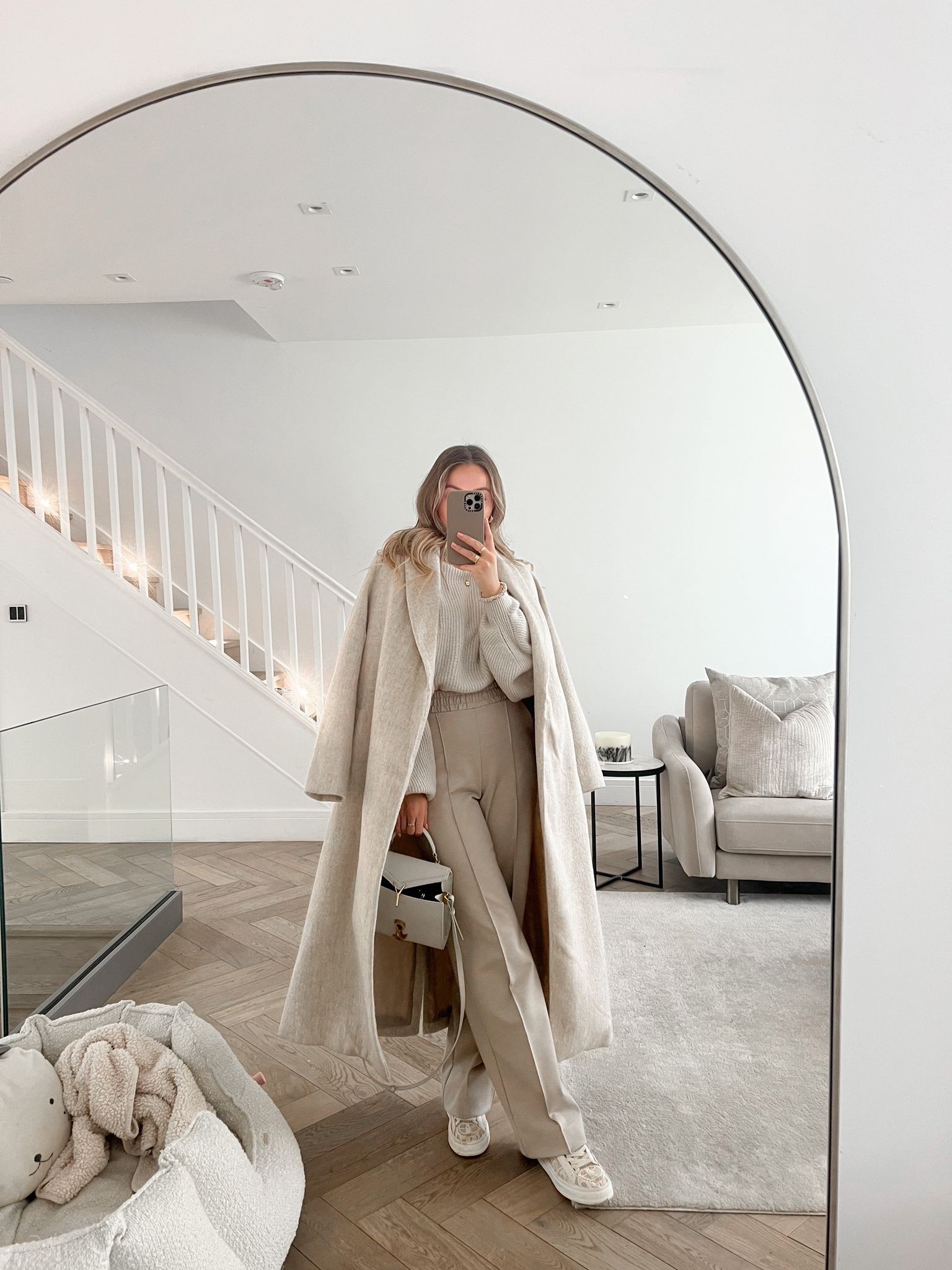 Creamy neutral look for a busy day around London. Jersey wide leg trousers, charli London knit jumper, new look belted coat, ysl cream bag & Chloe Lauren trainers  

#LTKSeasonal #LTKstyletip #LTKeurope