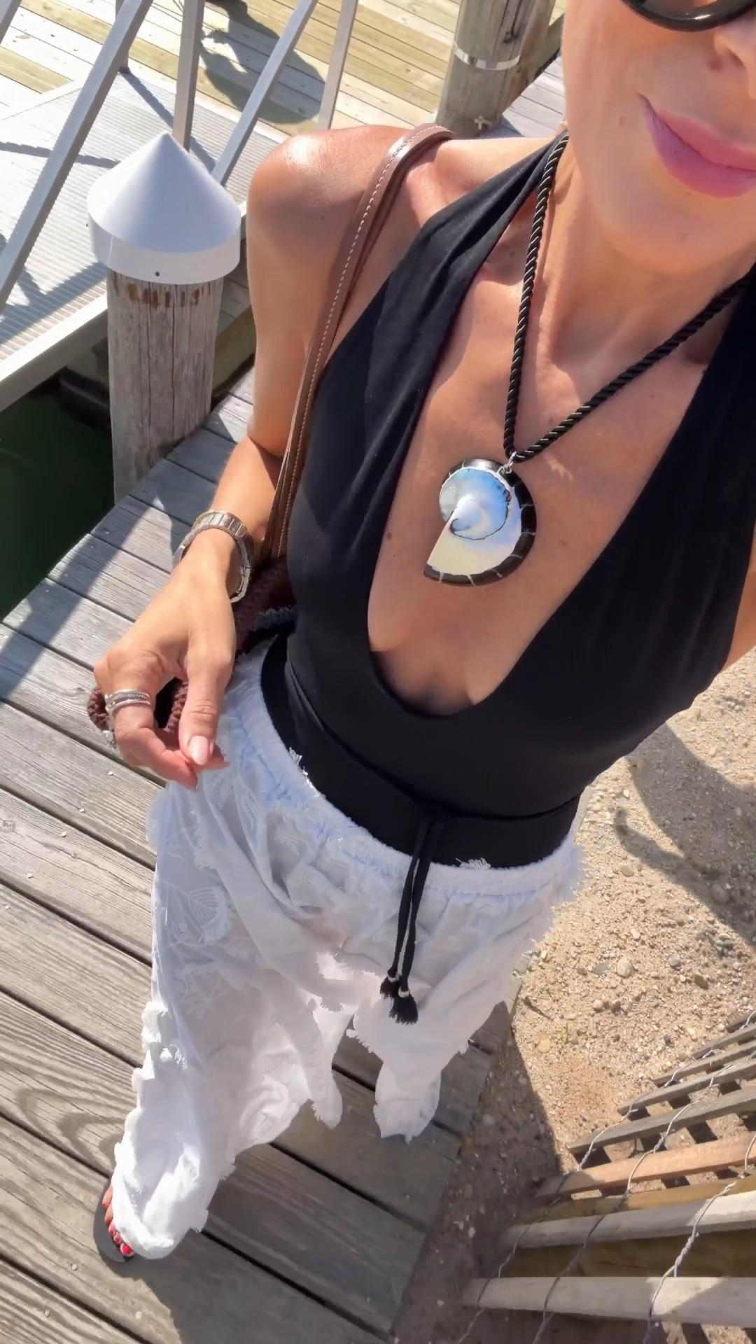 Beach day outfit to watch the final cup! 🖤

#LTKSeasonal #LTKOver40