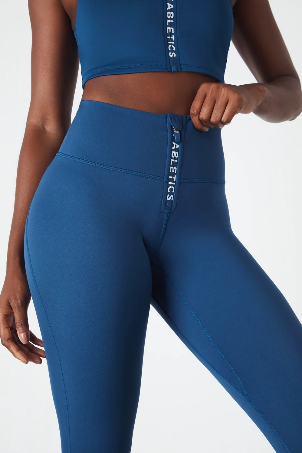 High-Waisted Motion365® Legging With Zipper | Fabletics - North America