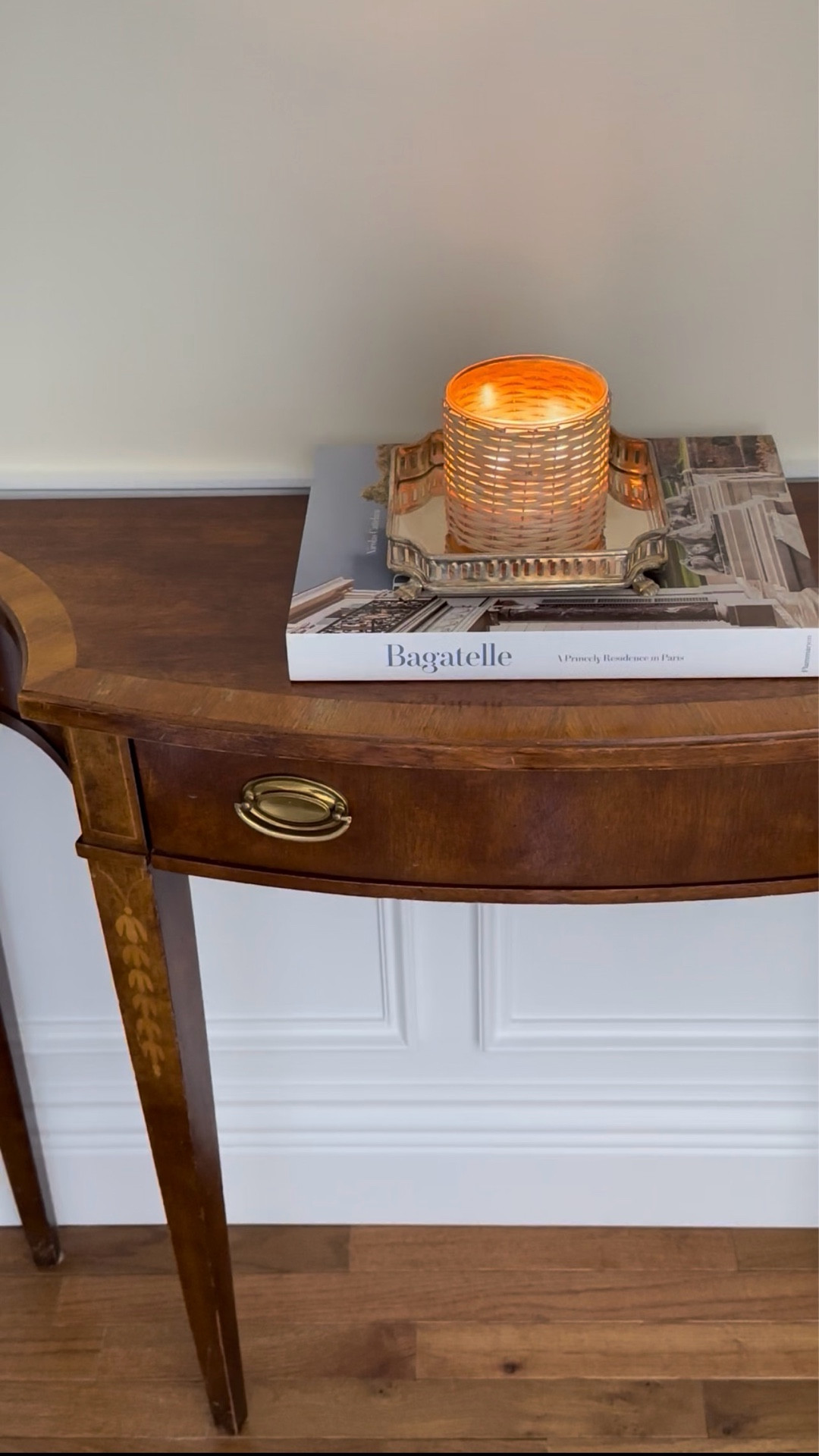 I love this woven candle styled on my hallway demilune table! ￼

#LTKHome #LTKSeasonal