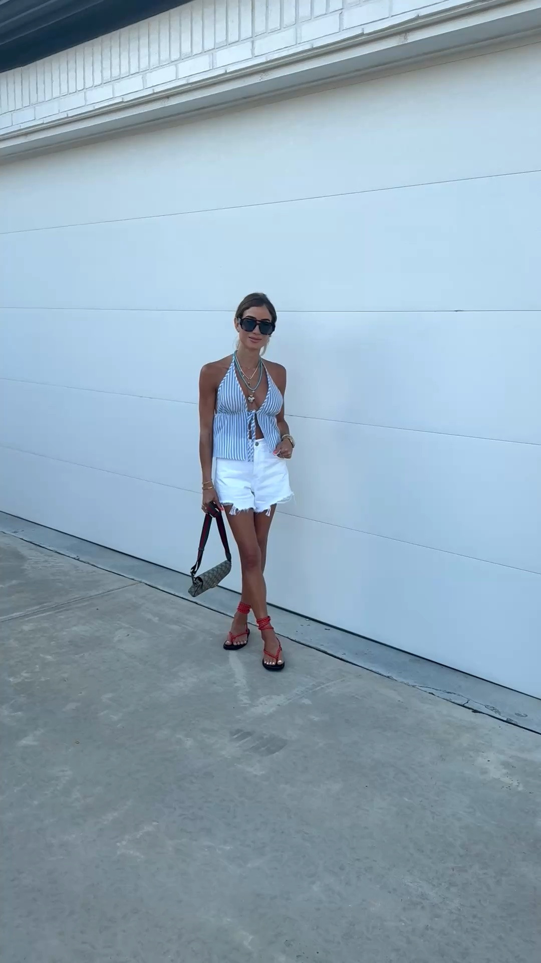 Summer outfit of the day wearing this adorable striped halter top, white denim shorts size 23 red rope sandals

#LTKootd #LTKPetite #LTKSaleAlert