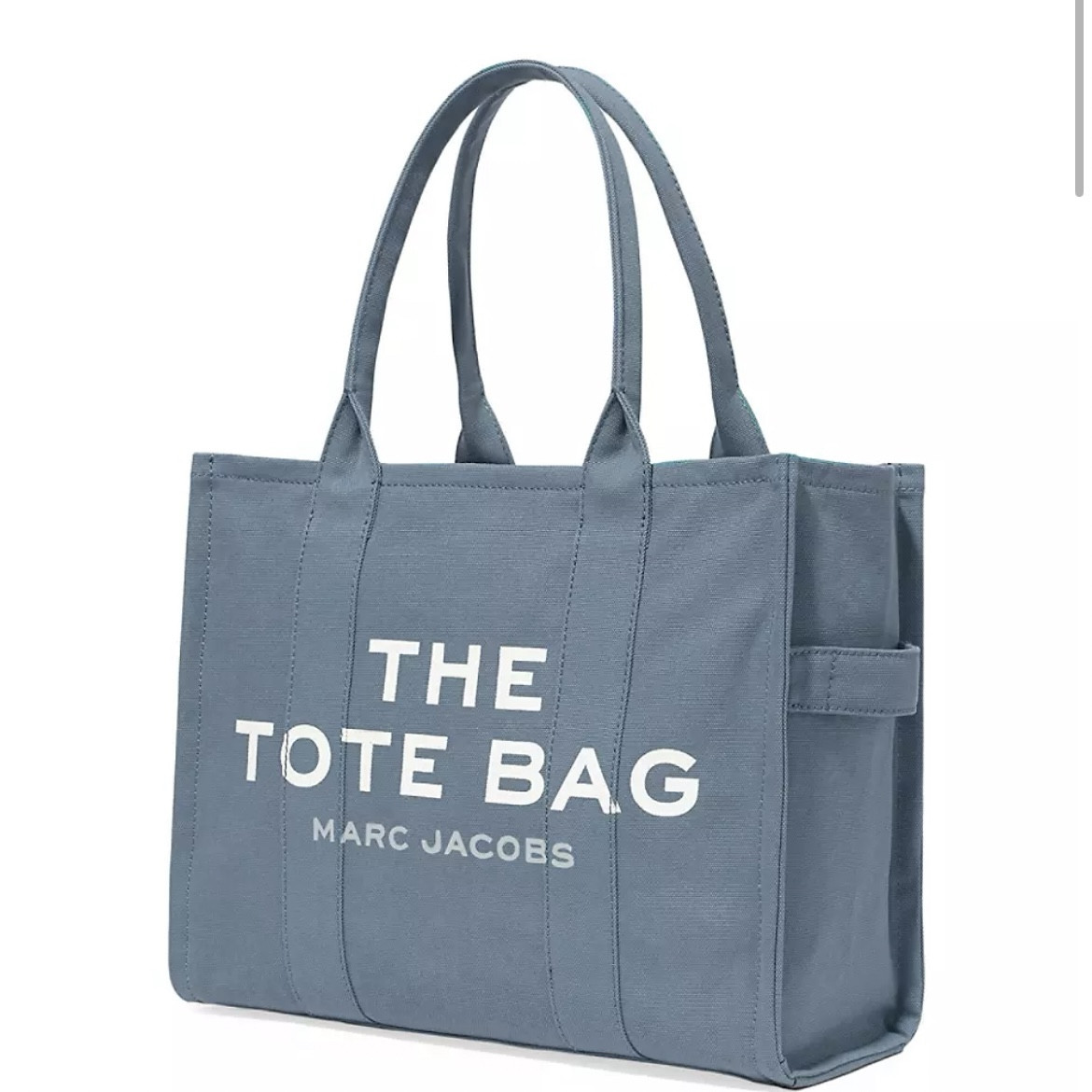 Marc Jacob’s | The Large Tote Bag

I bought this bag from Sak’s and love it! Obsessed with the color “Blue Shadow”. I use it for teaching, travel & will soon use as my diaper bag when we go to nice places. 

Emblazoned with a meta slogan, this tote bag features a spacious interior and logo accents.
Top zip closure
Black hardware
Two interior slip pockets
Fully lined
Cotton
Imported

SIZE
Double top handles, 9.45" drop
16.54"W x 13.39"H x 6.3"D
Style Code: 0400012246034

Price: $225 

#LTKMostLoved #LTKitbag #LTKworkwear