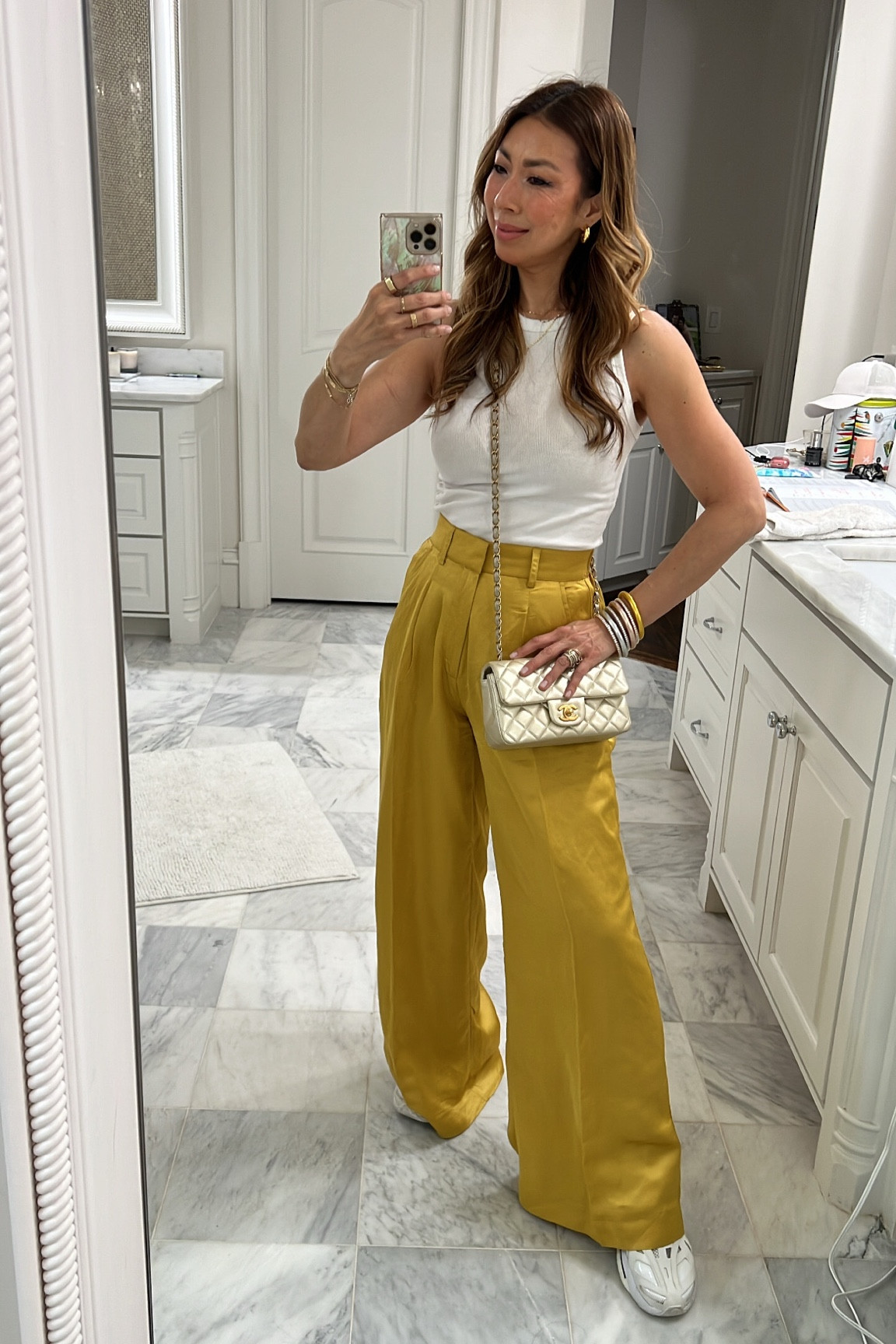 White tank & yellow/ citrine Laude the Label wide leg pants w/sneakers for running errands w/a crossbody bag #styleofsam #yellowpants #momuniform

#LTKshoecrush #LTKstyletip #LTKsalealert