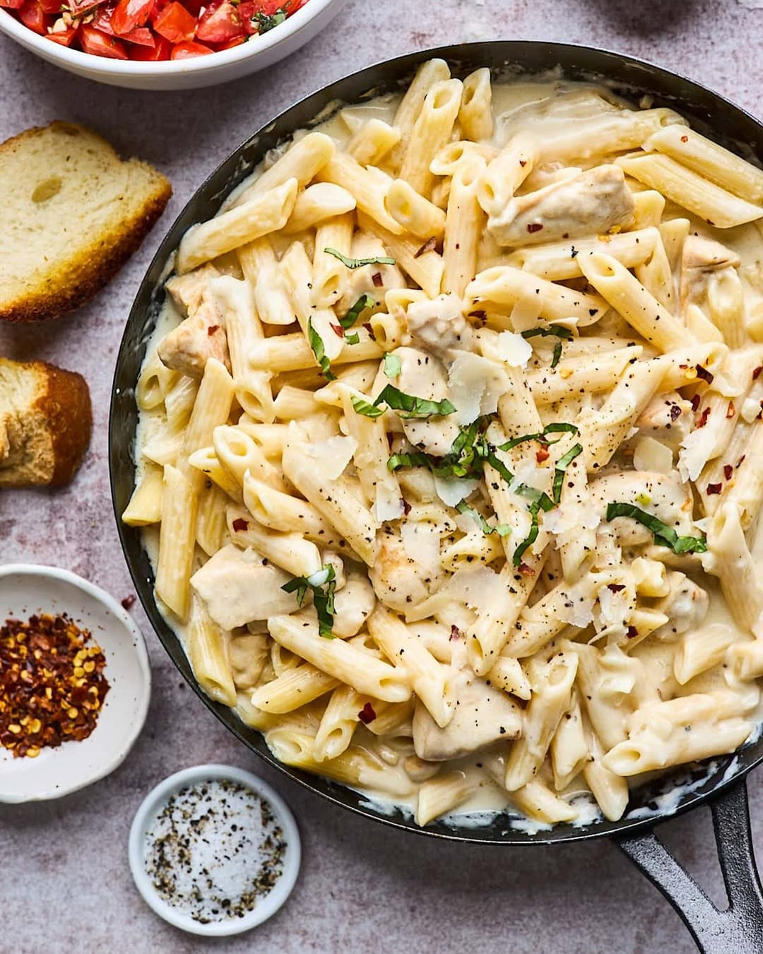 CHICKEN PENNE PASTA

✨Say hello to your new weeknight obsession!✨

This Chicken Penne Pasta is rich, creamy, and loaded with cheesy goodness—tossed with tender chicken and finished with a fresh bruschetta topping for a bright, flavorful twist. It’s the kind of dish that feels restaurant-worthy but comes together easily at home. Serve it with garlic bread and call it pasta perfection. 🍝🧄🍅 Full recipe on my blog: https://www.twopeasandtheirpod.com/chicken-penne-pasta/ 

 #LTKHome