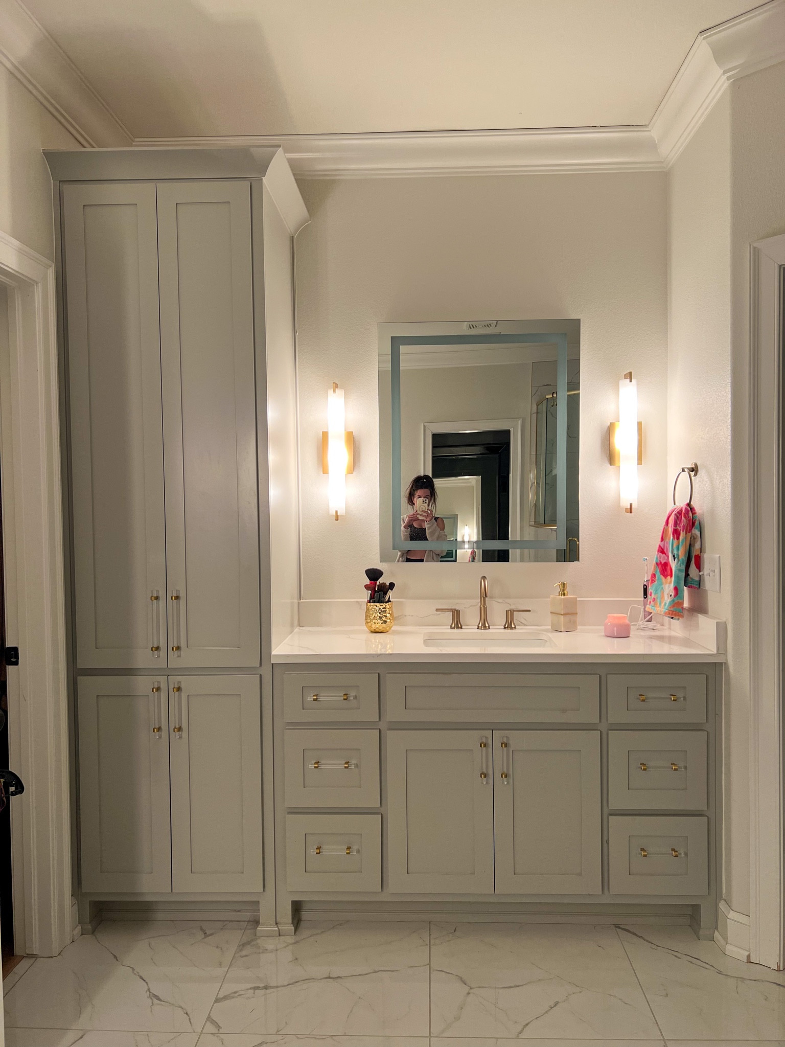 The mirror is LED lit, this is what it looks like off. Mine is hardwired in and turns on with the switch like when I turn on the lights but there are also buttons on the side to use manually. Finally cleaned my vanity today. 

#LTKhome #LTKsalealert
