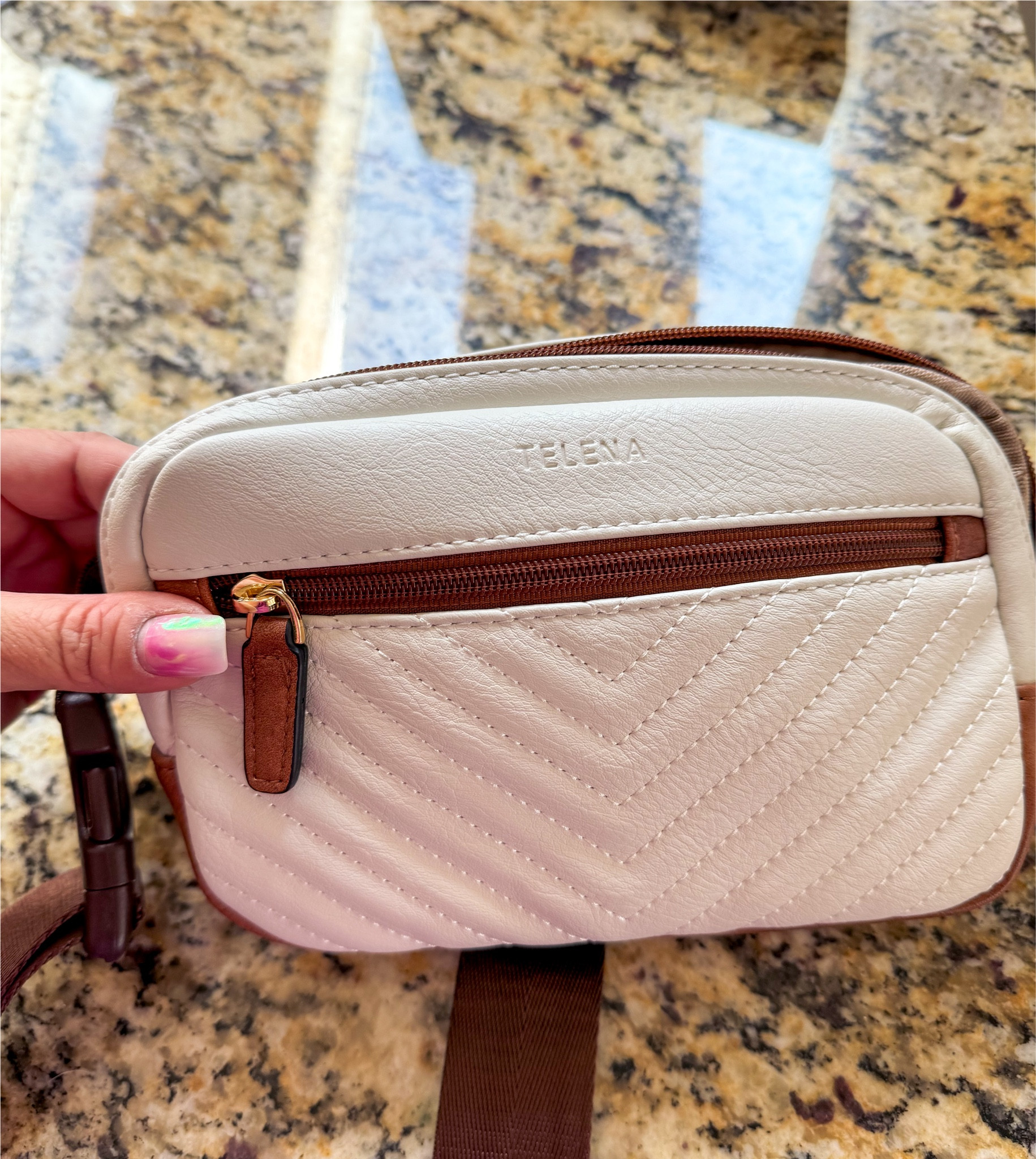 This quilted belt bag is neutral and versatile. My go-to bag for running errands!

#LTKtravel #LTKitbag #LTKover40