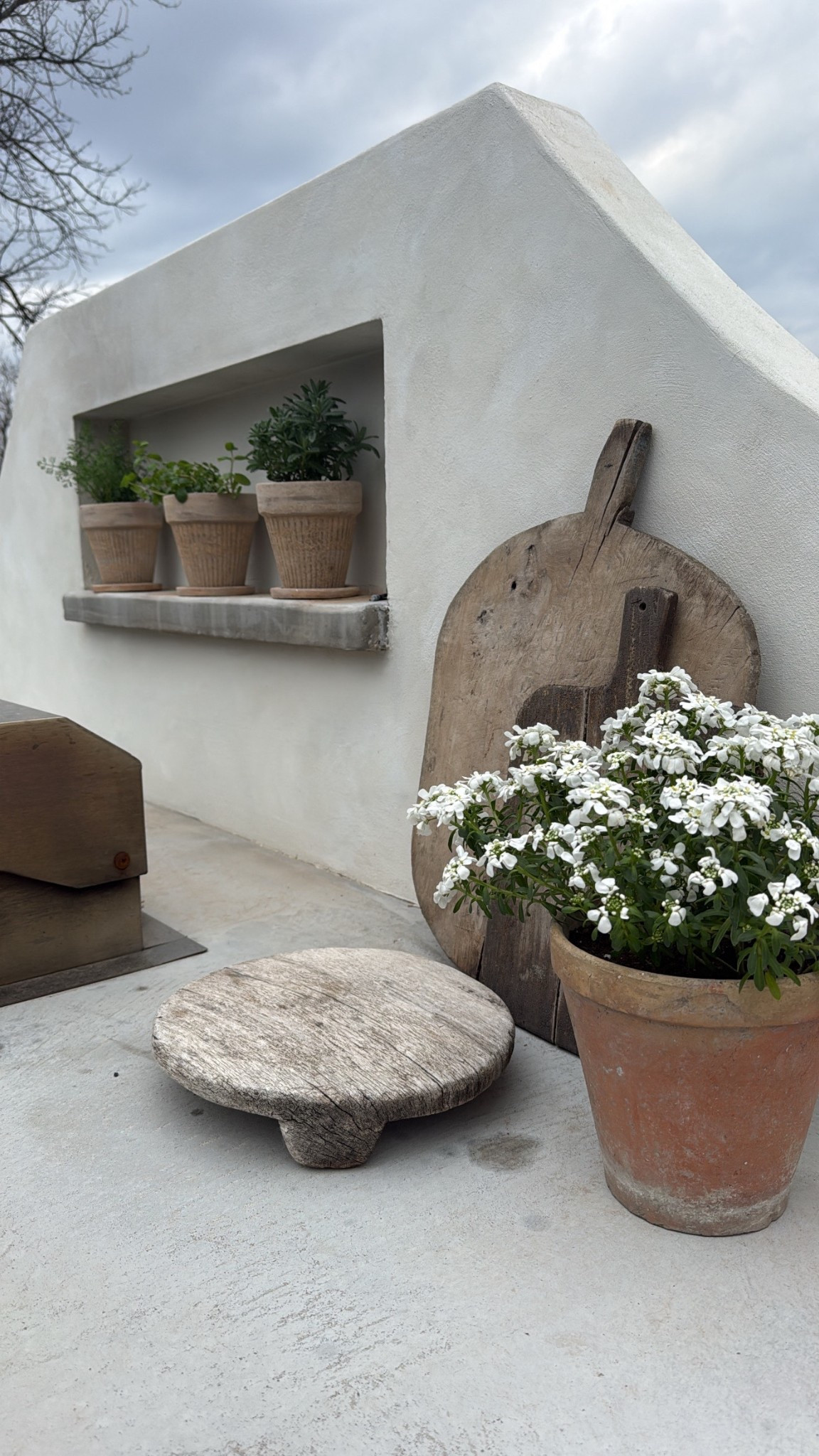 Spring is near! Prepping my outdoor kitchen space now by freshening some cute planters with herbs and adding back my vintage riser and breadboards  

#LTKHome #LTKSeasonal