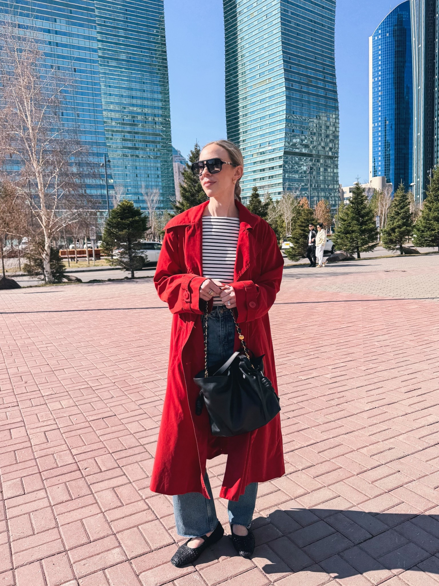 Spring outfit, red trench coat, striped top, @Zara straight leg cropped jeans, Loewe Flamenco pouch handbag

#LTKOver40 #LTKSeasonal #LTKSaleAlert