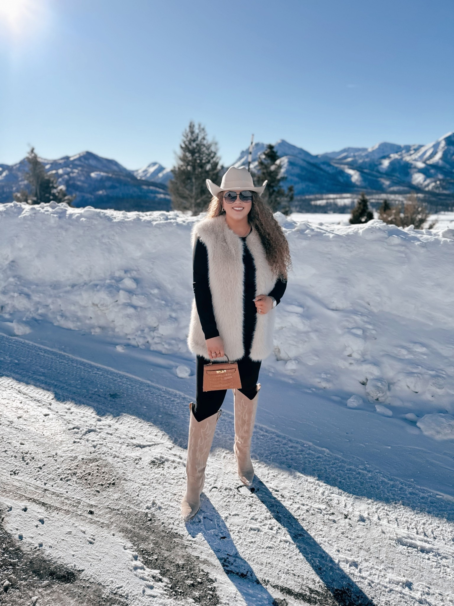 Western winter looks just hit different 🤍🤠 This is one of those outfits that feels easy but still makes a statement ❄️ Cozy layers, western touches, and snow day vibes. Everything I can link is here ✨ western winter outfit | cowgirl hat amazon | beige cowgirl hat | amazon western fashion | black fitted top amazon | western layering outfit | fur vest western look | winter cowgirl style | beige cowgirl boots amazon | amazon cowgirl boots | western snow outfit | casual western outfit | amazon aviator sunglasses | western accessories women | cozy western winter look | western outfit women | amazon fashion western | winter rodeo outfit | modern cowgirl style | cold weather western outfit

#LTKootd #LTKgrwm #LTKSaleAlert