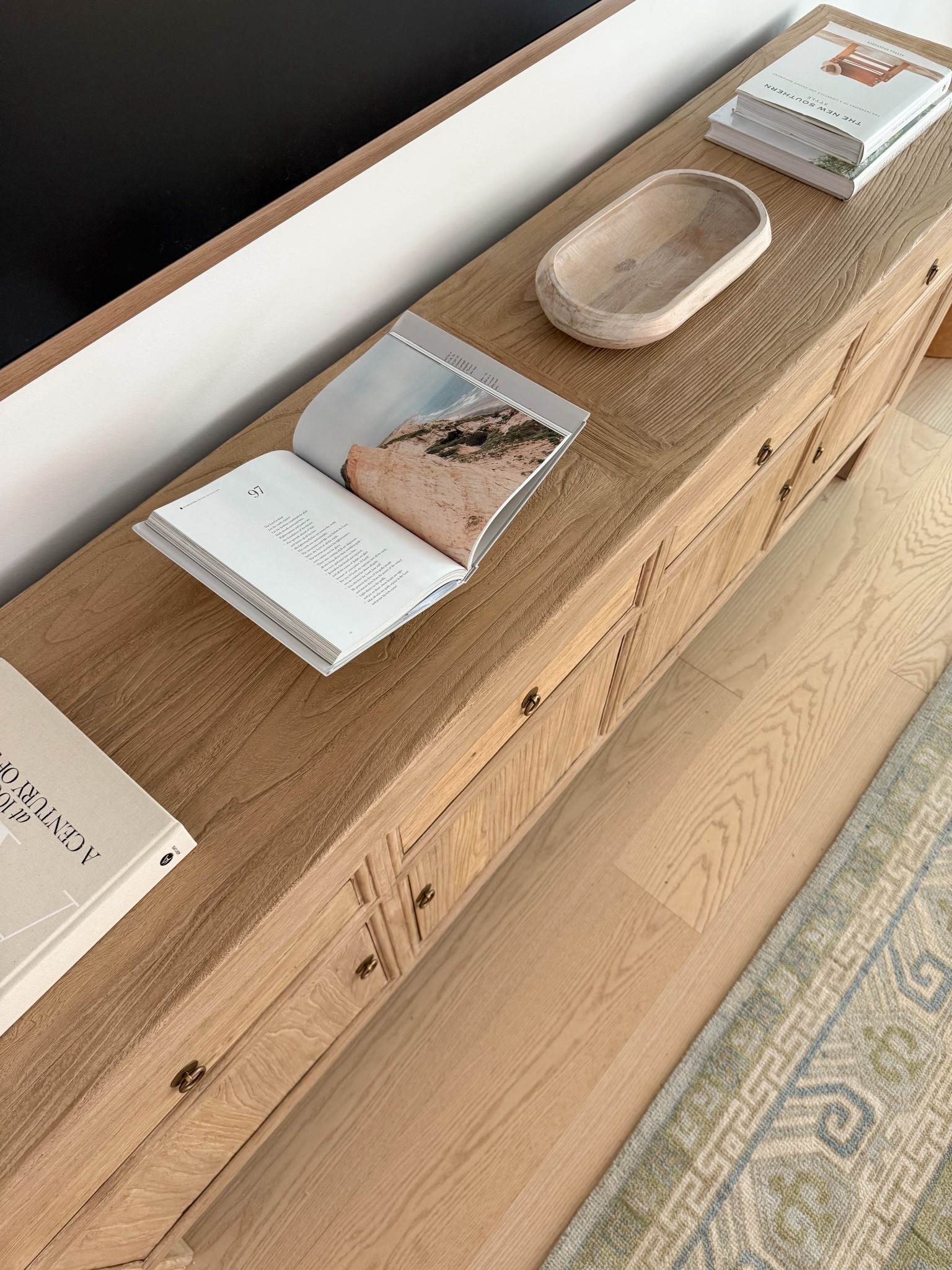 Finally, a great way to display the inside of all of those beautiful coffee table books! This book stand comes in a variety of marble options. This is the travertine. 