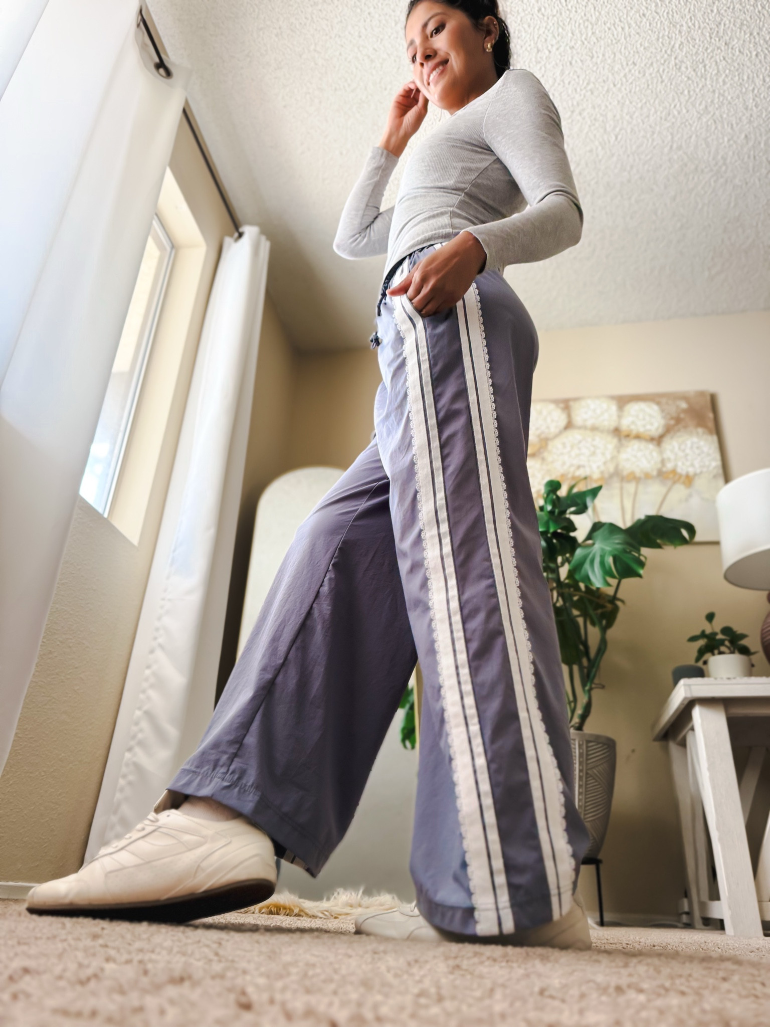 Obsessed with these newest wide leg pants 🤍 The perfect mix of comfy + chic with their flowy fit, flattering high waist, and statement side stripe detail. Easy to dress up or keep casual for everyday errands, travel days, or elevated athleisure looks. A must-have if you love effortless style with comfort ✨ #WideLegPants #OOTDInspo

wide leg pants outfit, striped wide leg pants, athleisure outfit women, casual chic outfit, comfy elevated basics, high waisted wide leg pants, trendy lounge pants, spring fashion outfit, neutral outfit inspo, stylish travel outfit, everyday casual fashion, flattering flowy pants, women’s relaxed fit pants, sporty chic outfit, versatile wardrobe staples