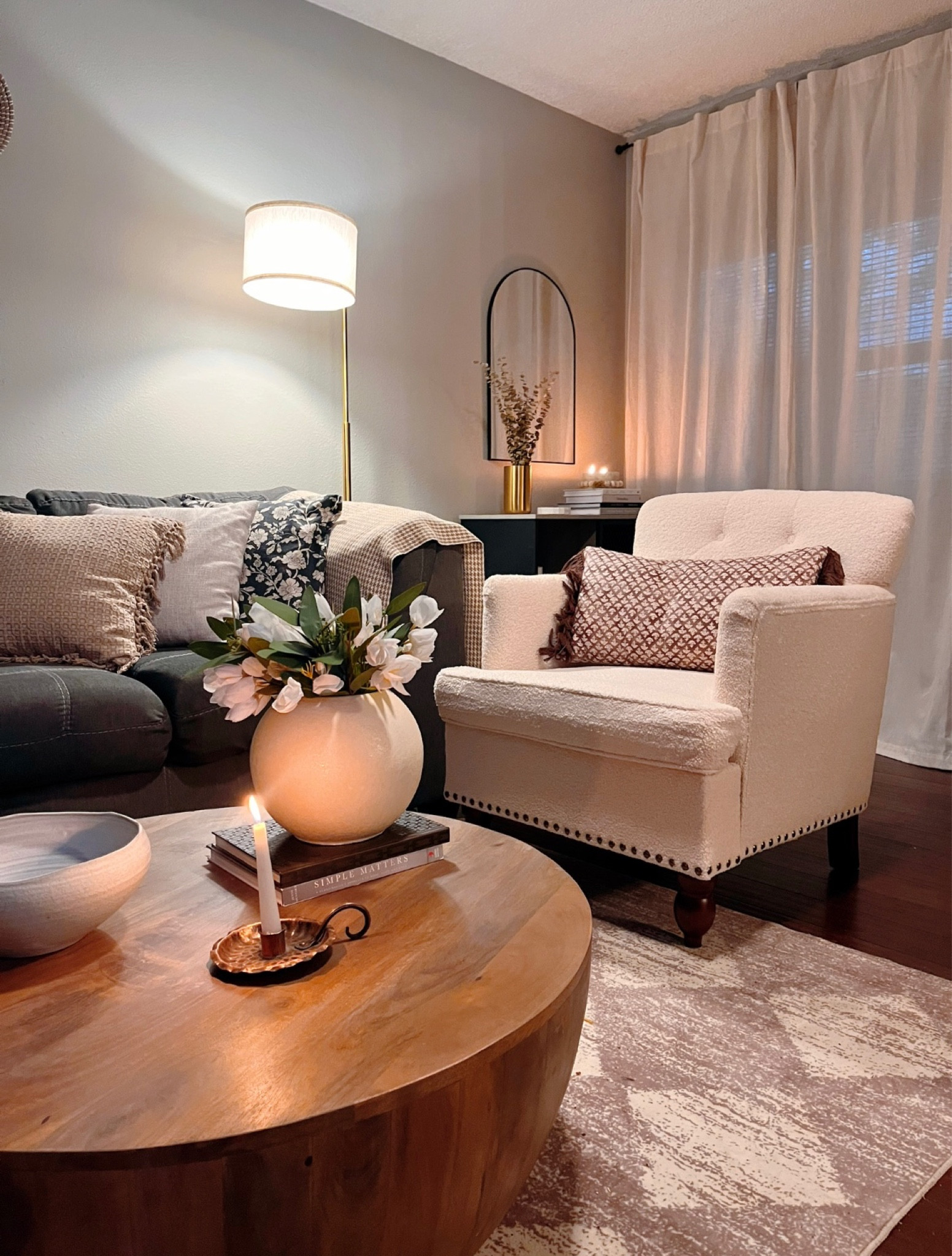 The prettiest boucle chair, Sherpa chair, accent chair, coffee table, vase, eucalyptus stems, gold vase, threshold vase, gold floor lamp, curtains, affordable, checker rug

#LTKFind #LTKhome #LTKunder100