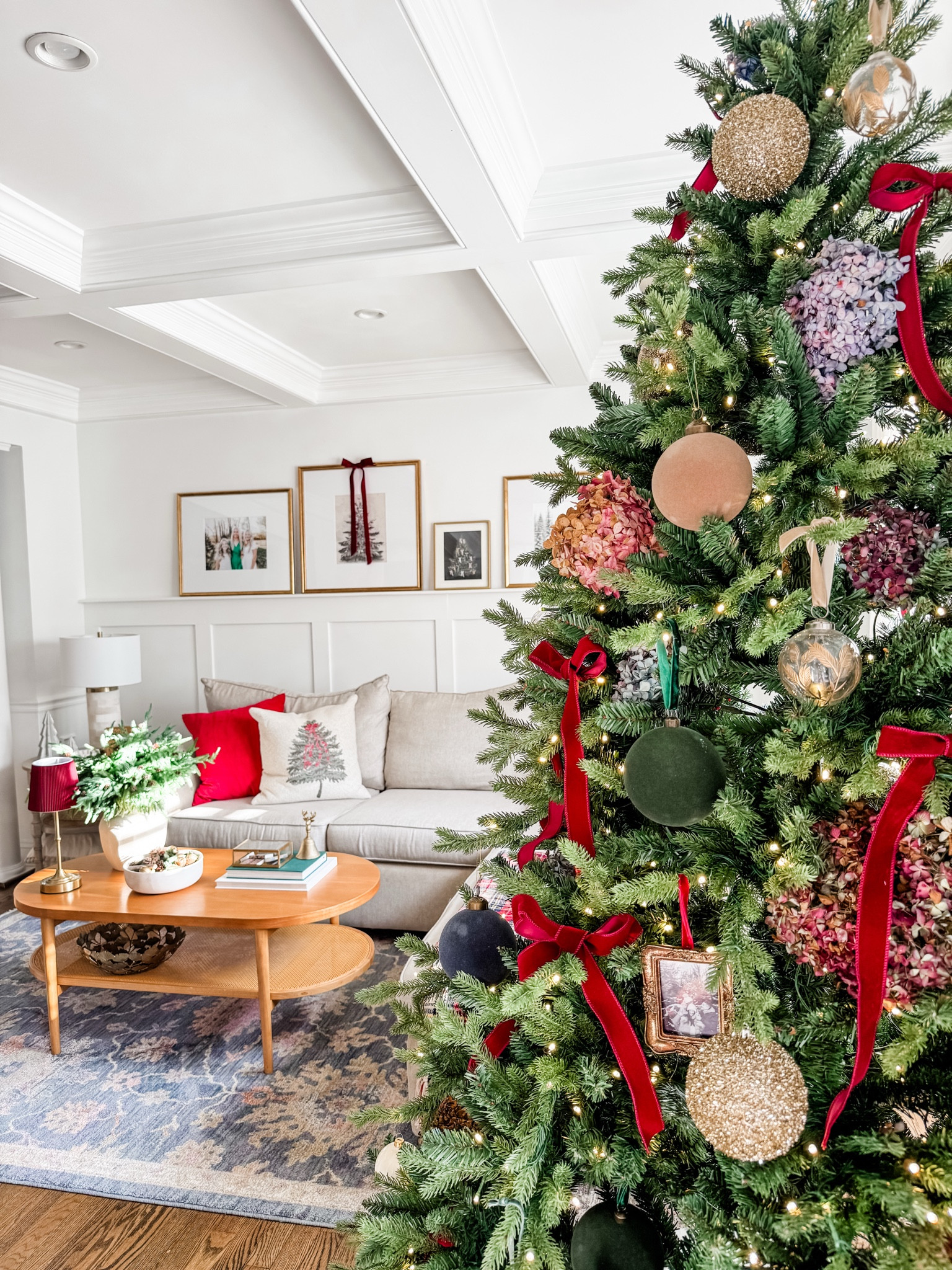 Ralph Lauren Christmas aesthetic 
Flocked Christmas balls
Velvet Christmas ornament 
Flocked ornament 
Mini antique gold framed Christmas ornament 
Oval coffee table
Christmas art print 
Holiday decor
Gallery frame
Christmas decor
Artificial Christmas tree
King of Christmas tree 
Burgundy velvet ribbon bow
Coffee table decor
Brass bell
Norfolk pine branch 
Artificial evergreen branch 
Red velvet throw pillow cover 

#LTKhome #LTKSeasonal #LTKstyletip