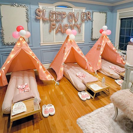 My daughters 1st sleepover party  set up 
The tent kit is so amazing it come with air mattress, balloons, fitted sheets tent and string lights all included. 

#LTKKids #LTKParties