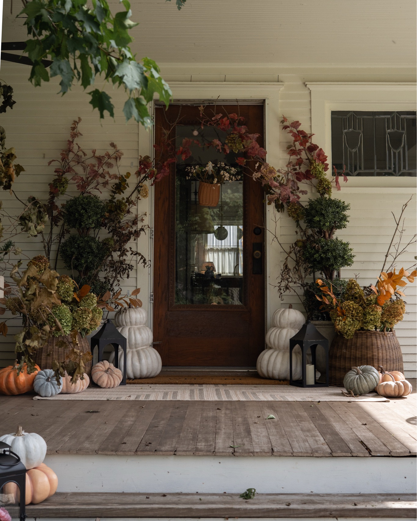 Collected front porch fall 🍂 Mixing found branches with faux florals + leaves for an arrangement that feels gathered, natural, and a little undone—in the best way. A few easy finds to recreate the look at home. 🤎

#LTKHome #LTKSeasonal