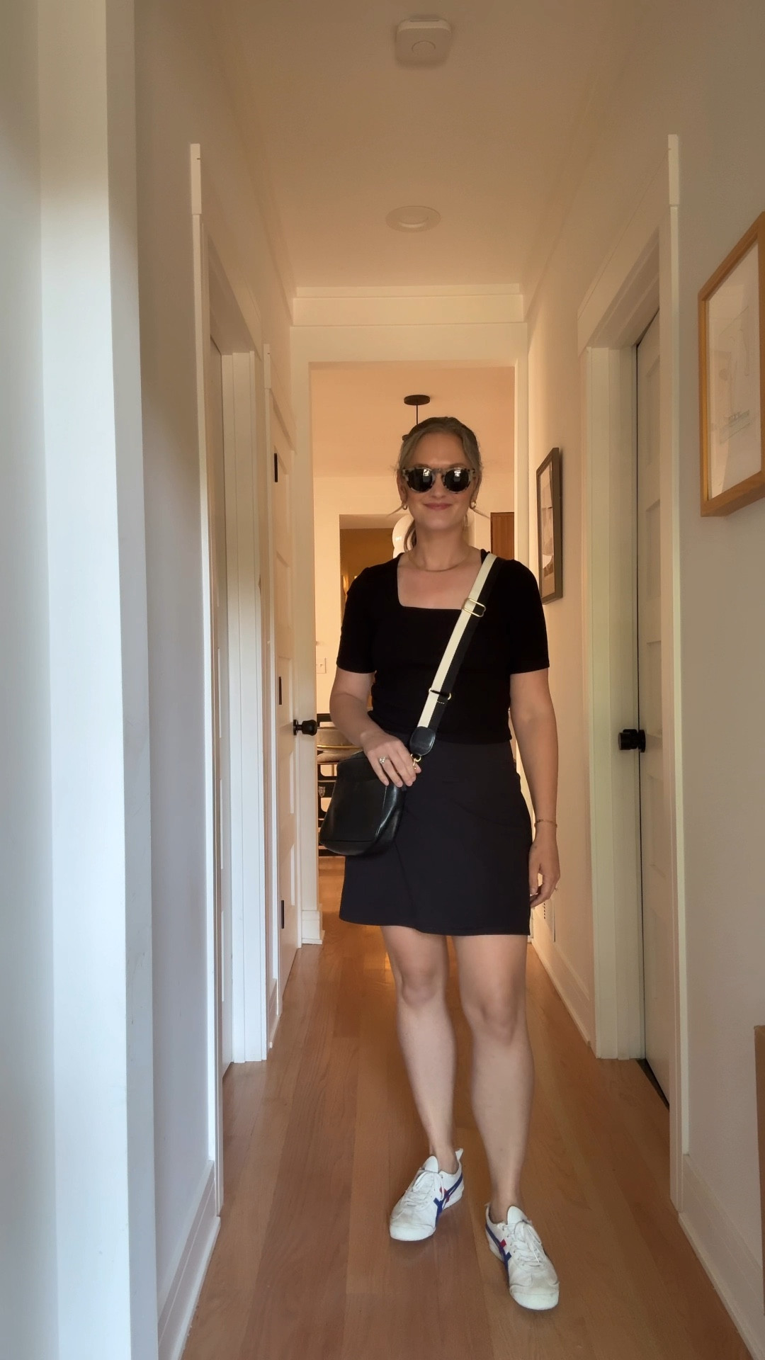 It’s a Thursday in August, and the city mom isn’t even pretending she’s wearing anything but athleisure: a black athleisure skirt paired with a black cropped tee, her favorite sneakers ready for action, and her go-to gold hoops and signature herringbone necklace adding just the right touch of polish. Her new stack of permanent bracelets jingles as she moves through a whirlwind day: daycare drop-off, steaming and packing clothes for tomorrow’s photoshoot, squeezing in a last-minute manicure in case there are any close-up shots of her hands, firing off emails, and—most thrilling of all—selecting the official logo for the Chicago Literary Salon. By evening, she’s back at physical therapy, tackling both her sprained ankle and the pulled muscle in her back, before finally picking up her son and settling in for a much-needed, low-stakes train-play session. In athleisure, with just enough sparkle, she’s officially conquered the chaos of the day—without missing a beat.

#LTKTravel #LTKFamily #LTKActive