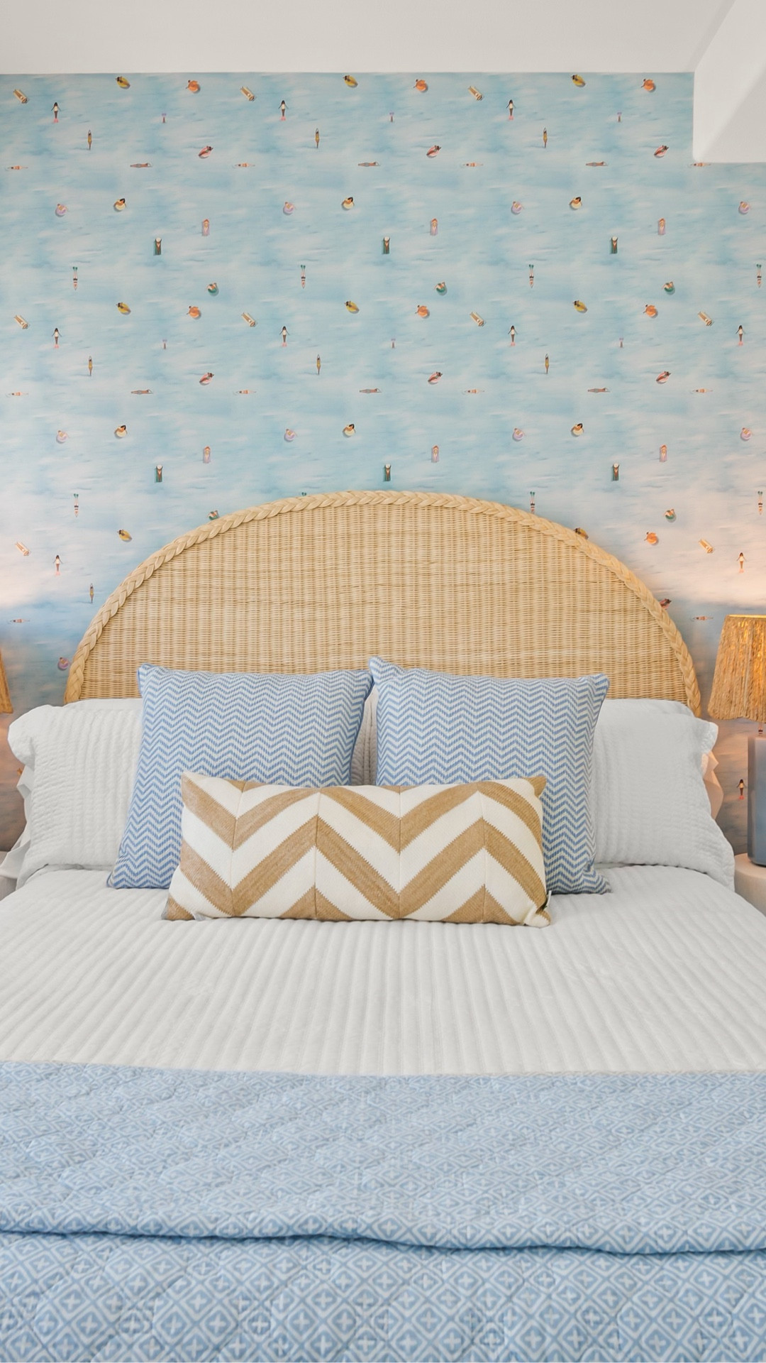 Why stop at the ocean view when your walls can dive in too? 🌊 At Island Blush, this bedroom pairs the real deal outside with a whimsical splash inside — featuring ‘People in the Water’ wallpaper by @chasingpaper. Coastal vibes, no sunscreen required. ☀️👙

#LTKHome #LTKSwim #LTKselfcare