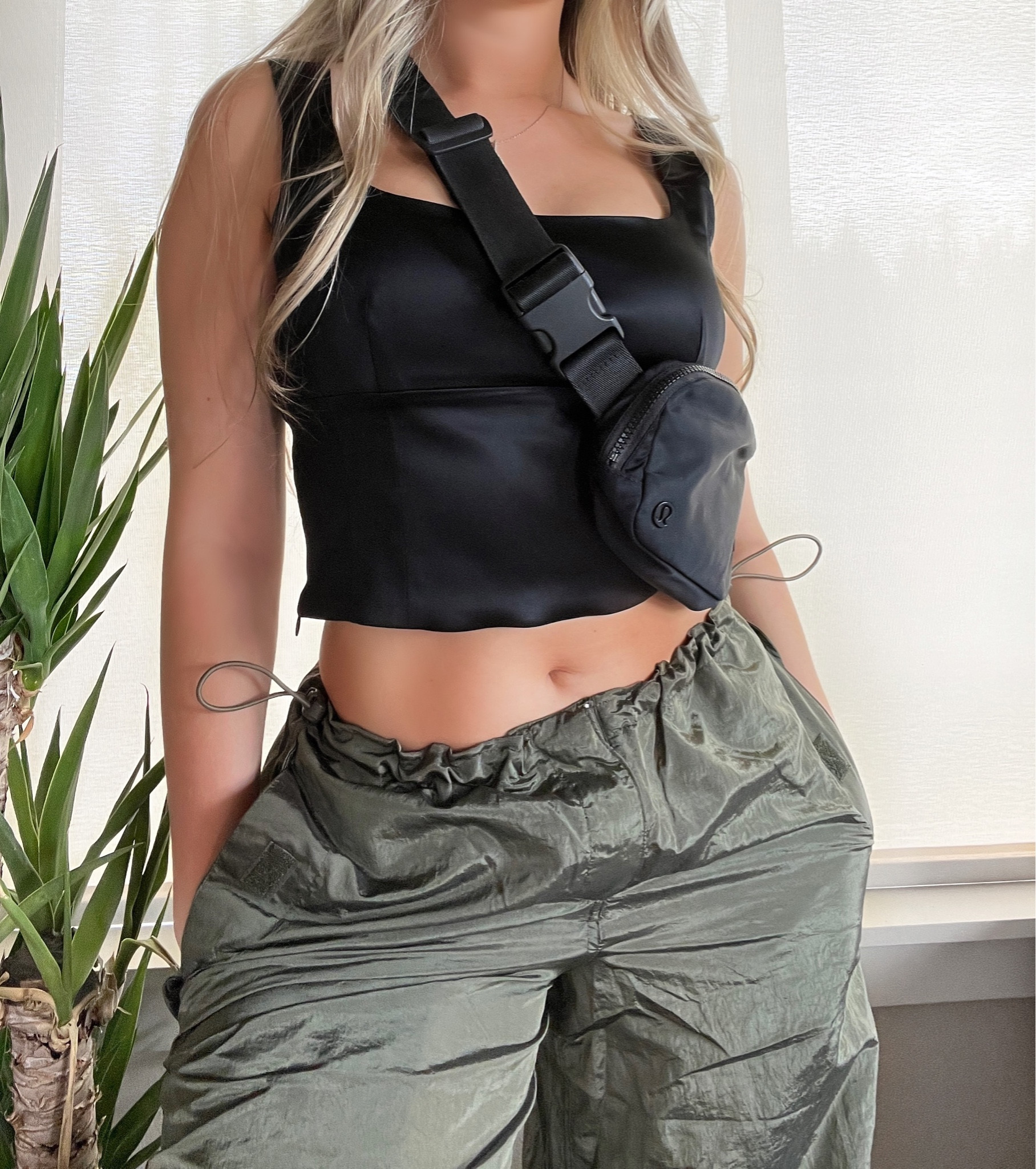 Comfort meets style in this athletic street wear outfit, perfect for the go-getter who wants to look and feel their best. Elevate your wardrobe with these parachute pants and Wilfred bustier combo (from Aritzia but I added a similar one), paired with the convenience of a Lululemon belt bag. Don't just dress for the day, own it with this inspired look!

#LTKtravel #LTKunder100 #LTKfit