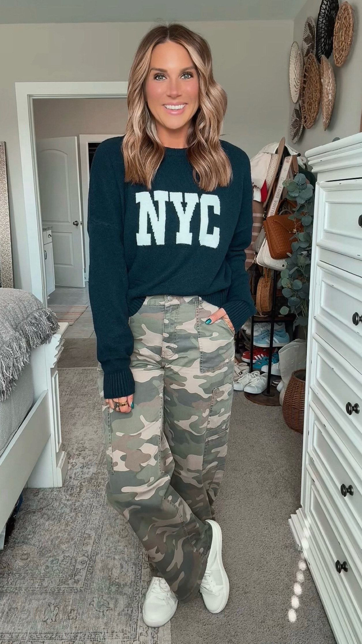 I love this collegiate style sweater! This blue sweater features NYC and pairs so well with these super trendy camo army cargo pants. Paired with white sneakers this is a great option for a fall mom outfit! All from Walmart and super affordable.

#LTKMidsize #LTKSeasonal #LTKFindsUnder50
