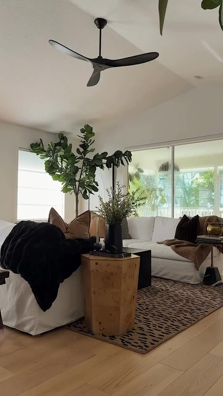 I wanted a new sofa…so I moved ours instead.  Leave LIVING below and I’ll send you all of the details- the rug is on sale! 🤎🖤 Also- the fiddle leaf was restocked in 10’! 

#LTKSaleAlert #LTKFindsUnder50 #LTKHome