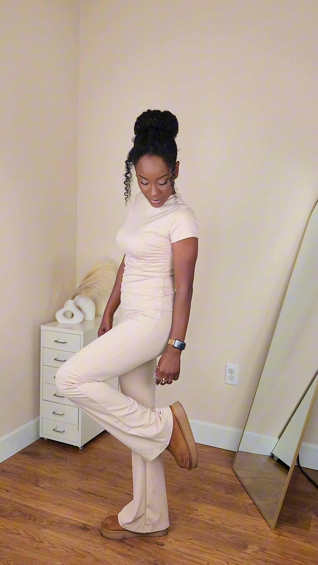 Beige Matching Set 🤎 This beige matching yoga Set is the the perfect elevated athleisure look. Featuring a fitted neutral top and foldover flare leggings, styled with cozy boots for a chic off-duty vibe. Comfortable, flattering, and perfect for errands, travel days, or casual brunch. I'm wearing a size XS in the set and a size 8 in the boots. I usually wear and 8.5 in shoes, but the 8 fits perfectly in these cozy boots. 
@Marshalls 

#LTKgrwm #LTKSpringSale #LTKActive