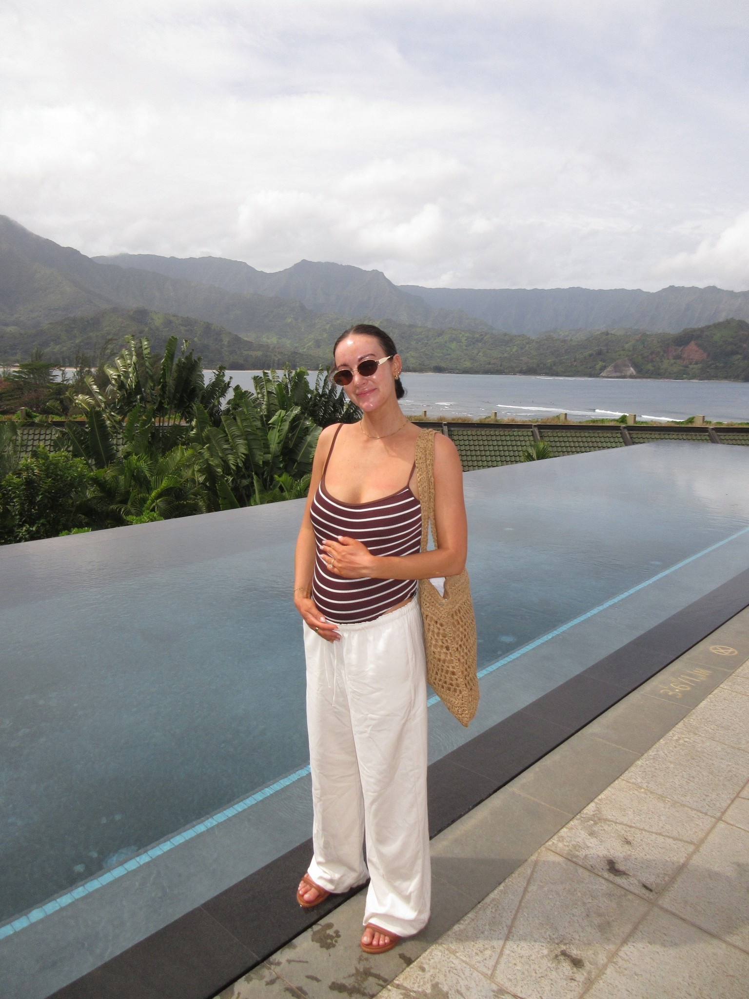 5’10 - pants are medium, swim is OS, bag is rented from FashionPass, shoes size down 1/2 size